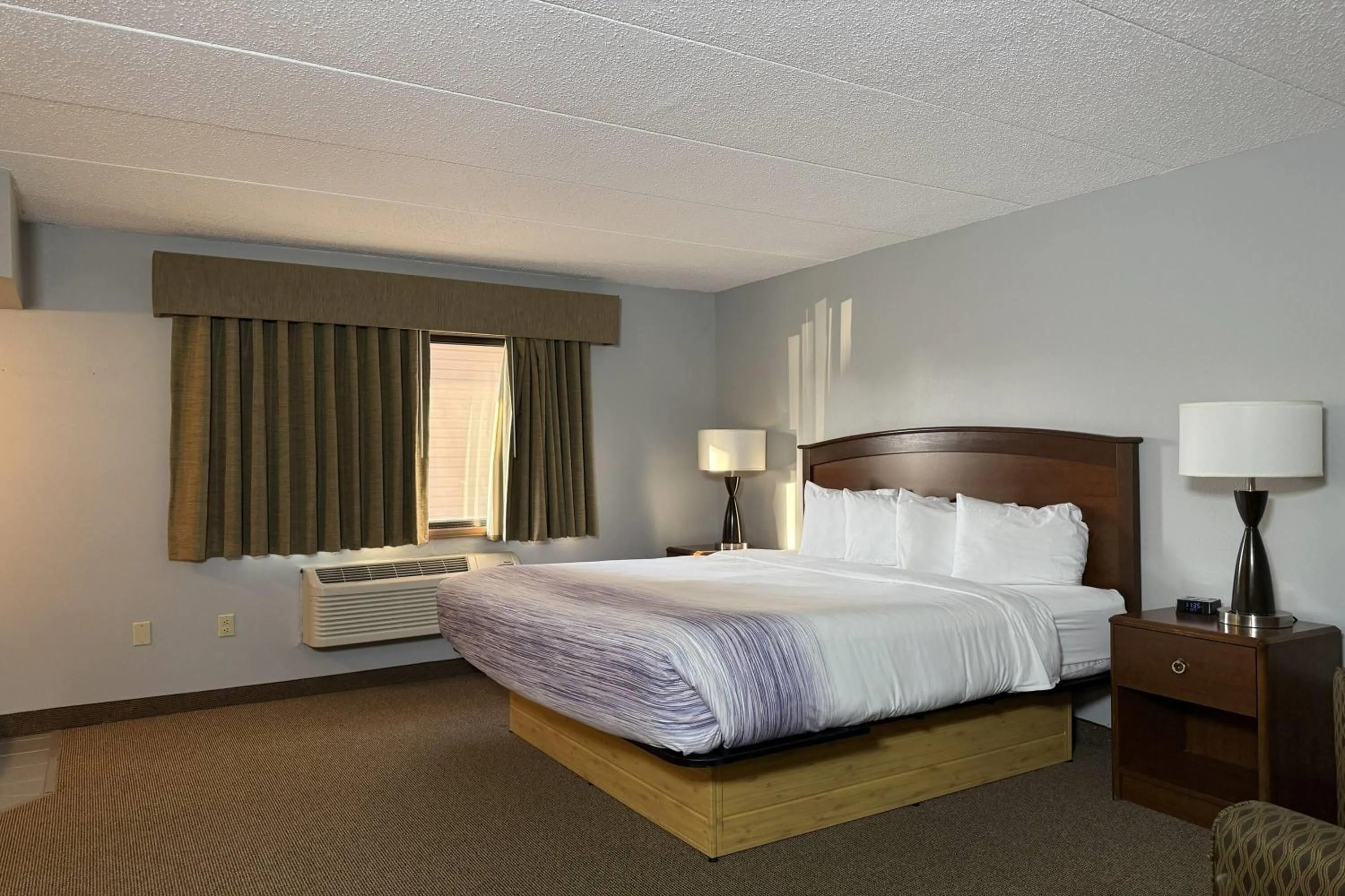 Photo of the whole room, Bed in AmericInn by Wyndham Sioux Falls