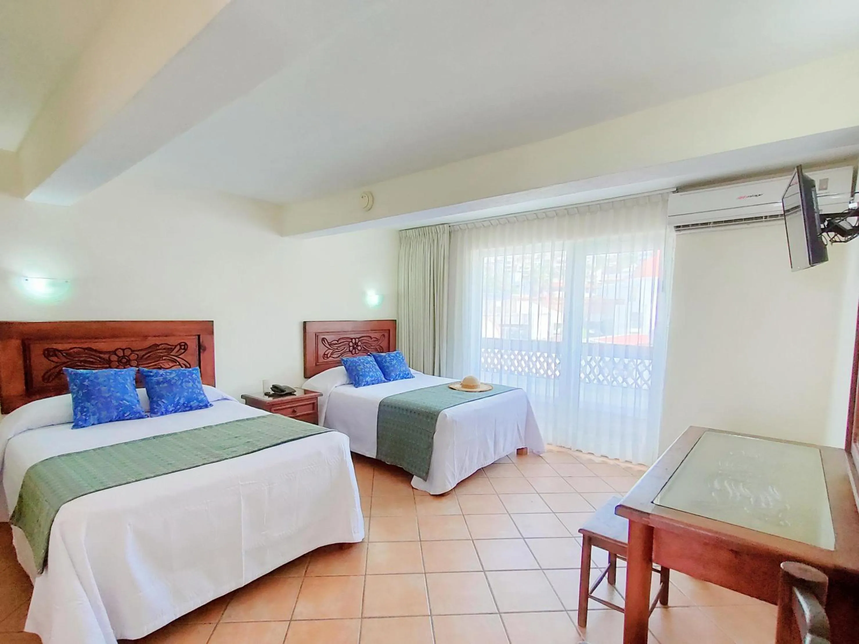 TV and multimedia, Bed in Hotel Rosita