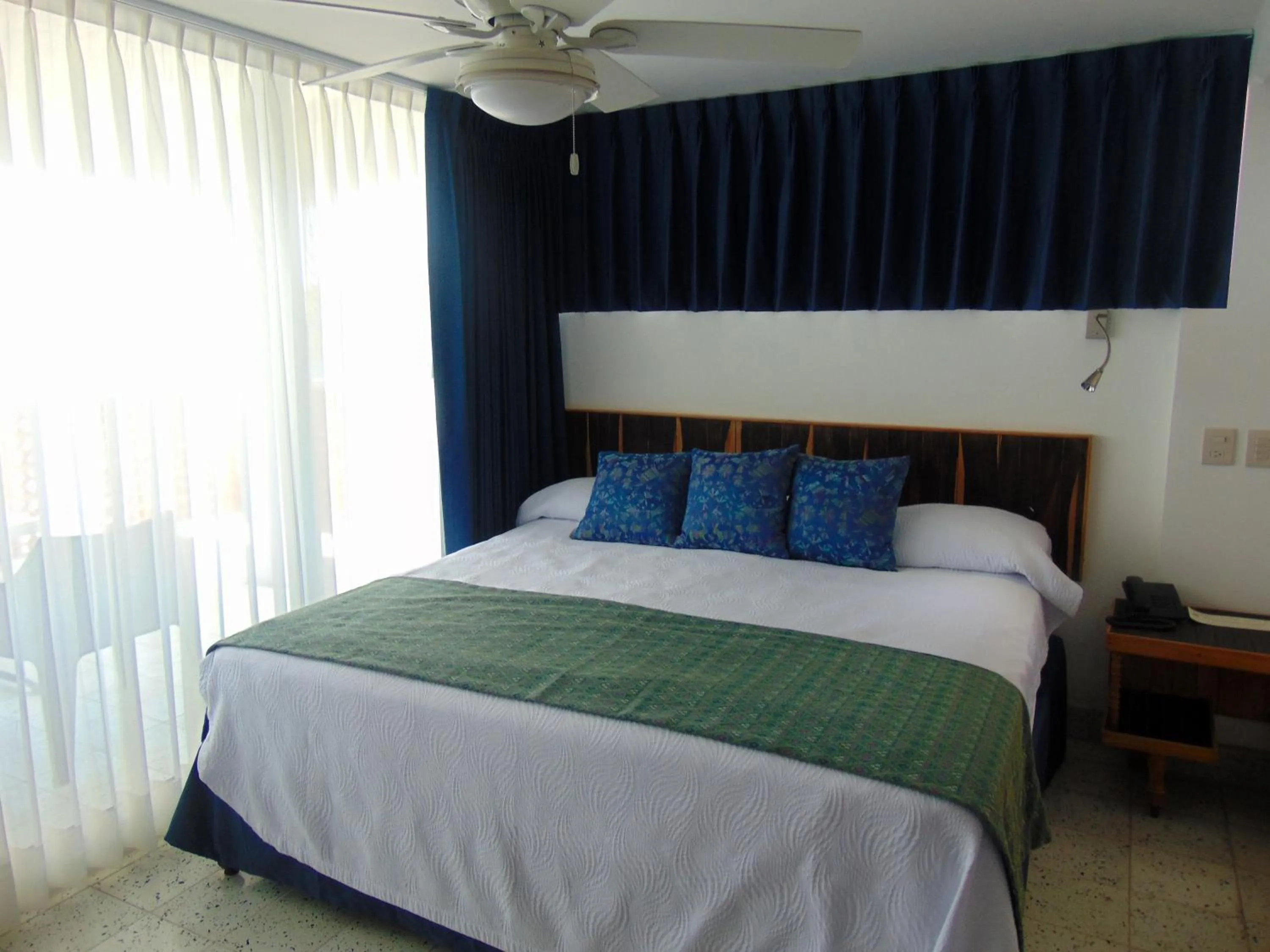 Property building, Bed in Hotel Rosita