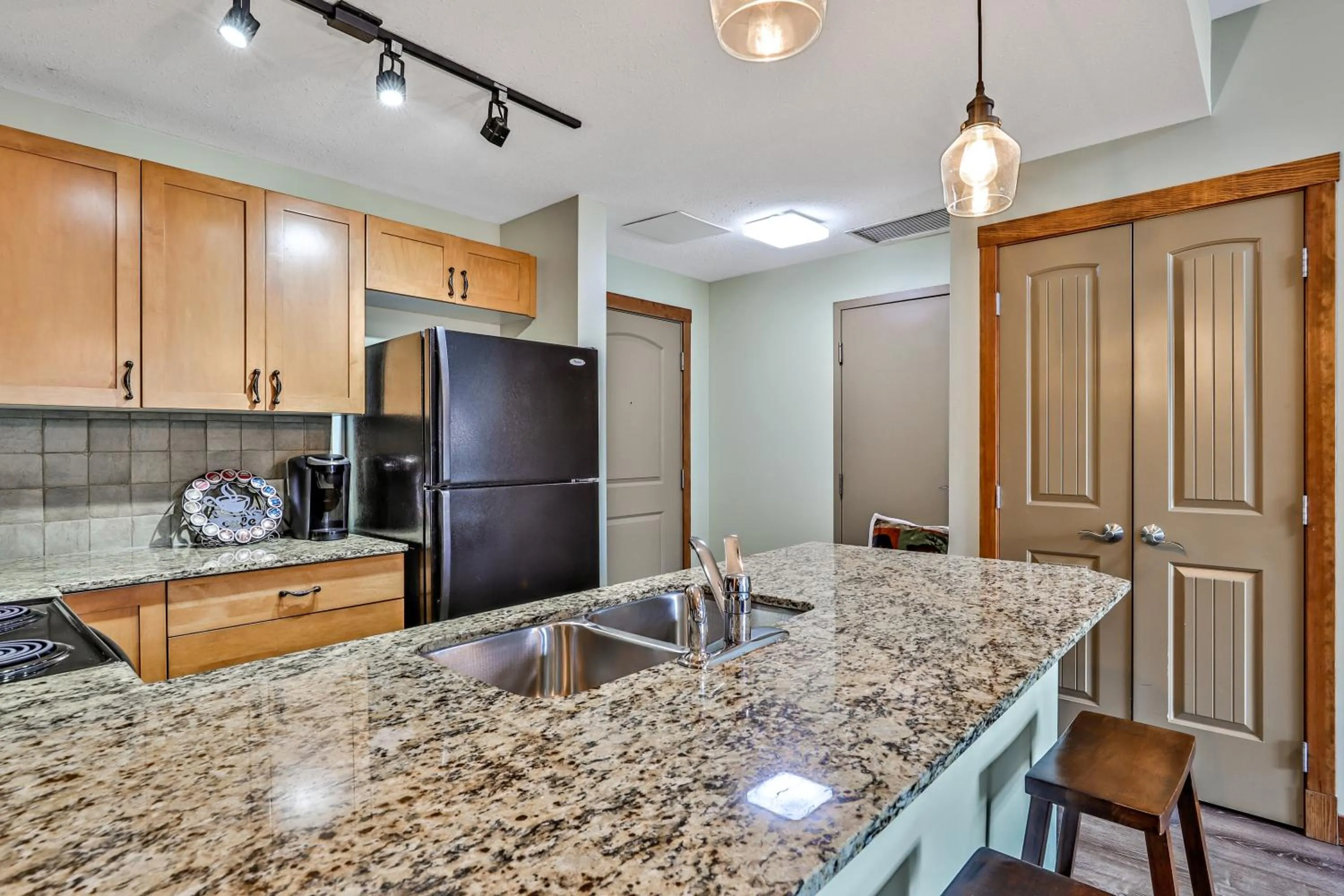 kitchen in Inviting Rocky Mountain HOT TUB in Top Rated Condo managed by Little Sister Getaways