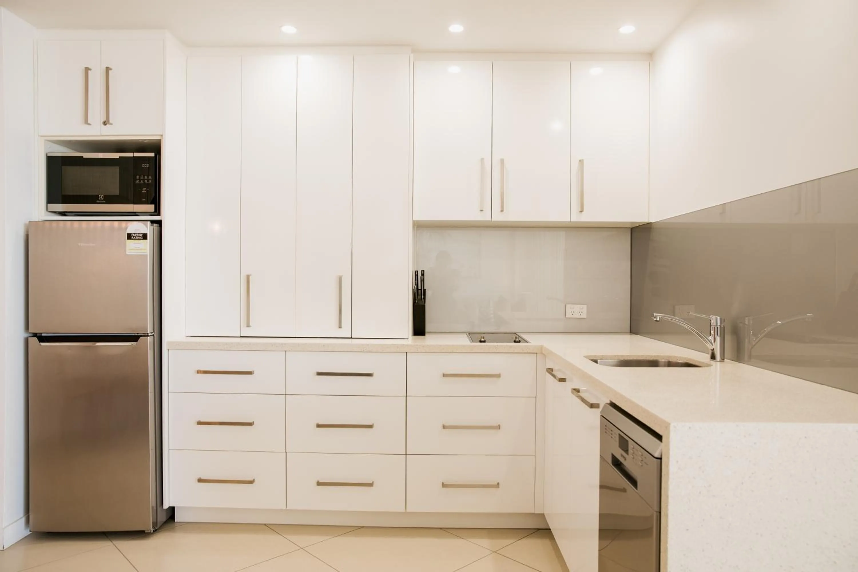 Kitchen or kitchenette in On The Beach Noosa Resort
