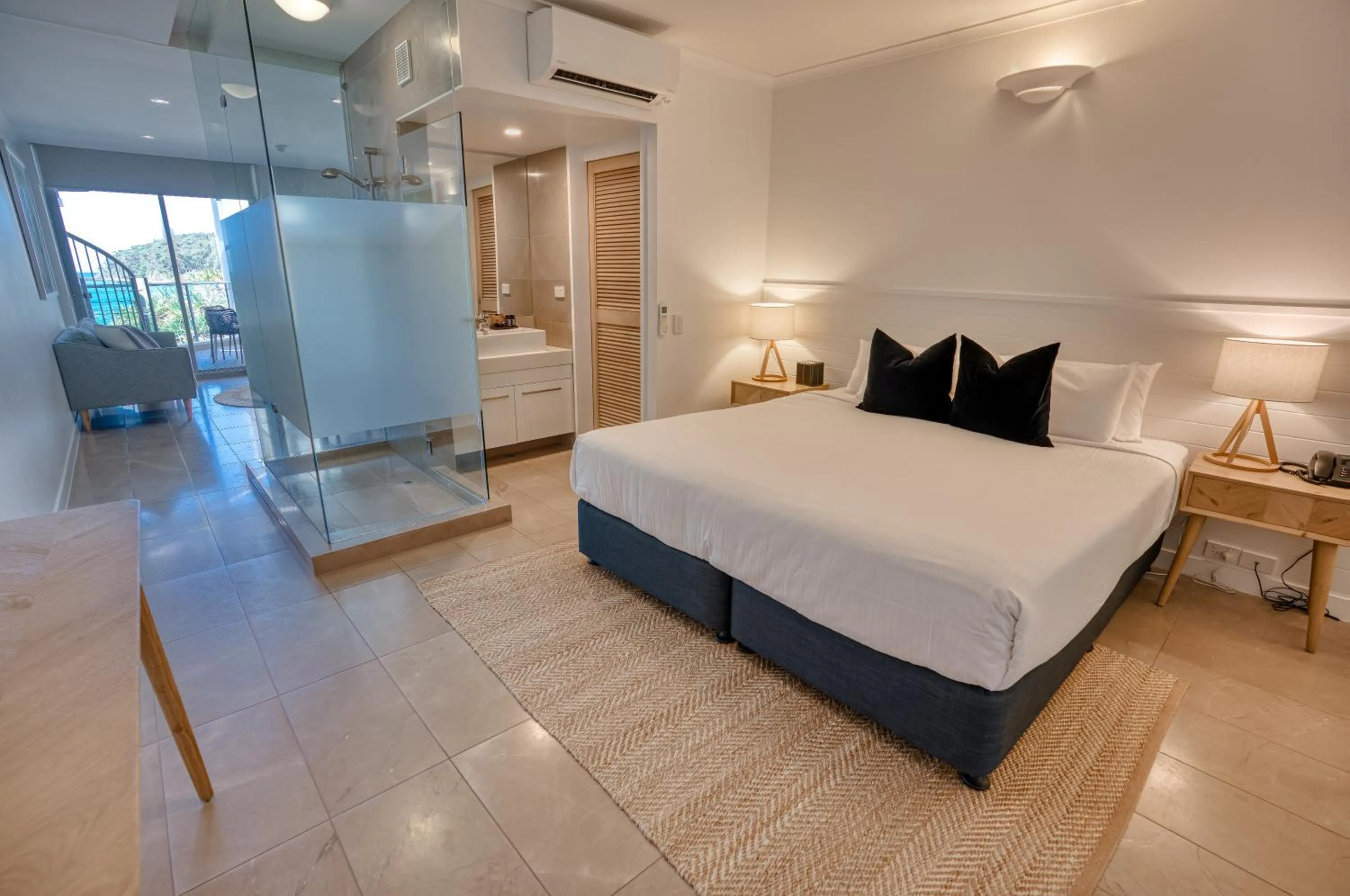 Shower, Bed in On The Beach Noosa Resort