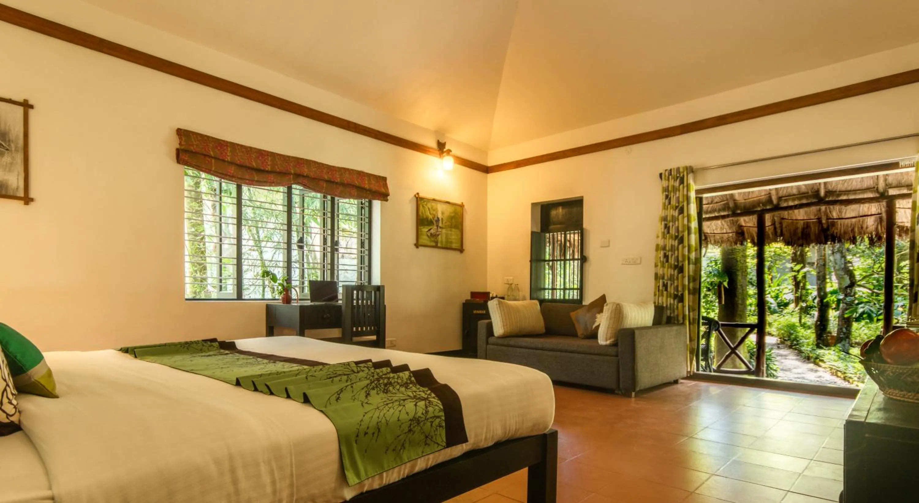 Bed in Amritara Shalimar Spice Garden Resort & Spa