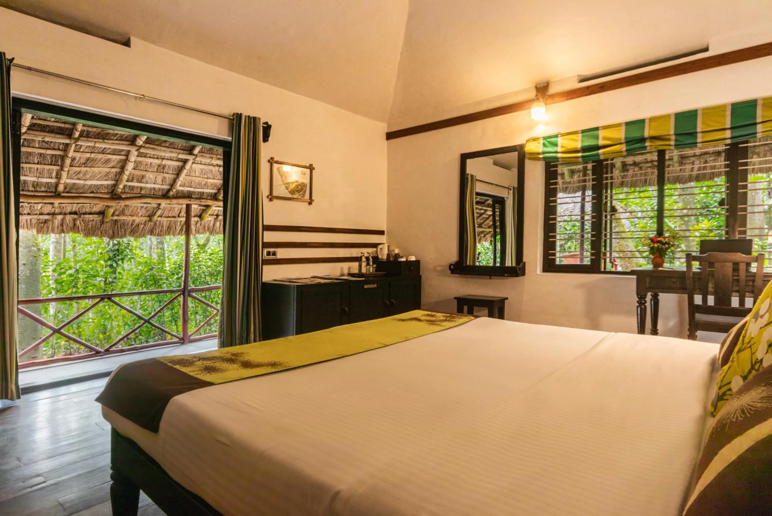 Bed in Amritara Shalimar Spice Garden Resort & Spa