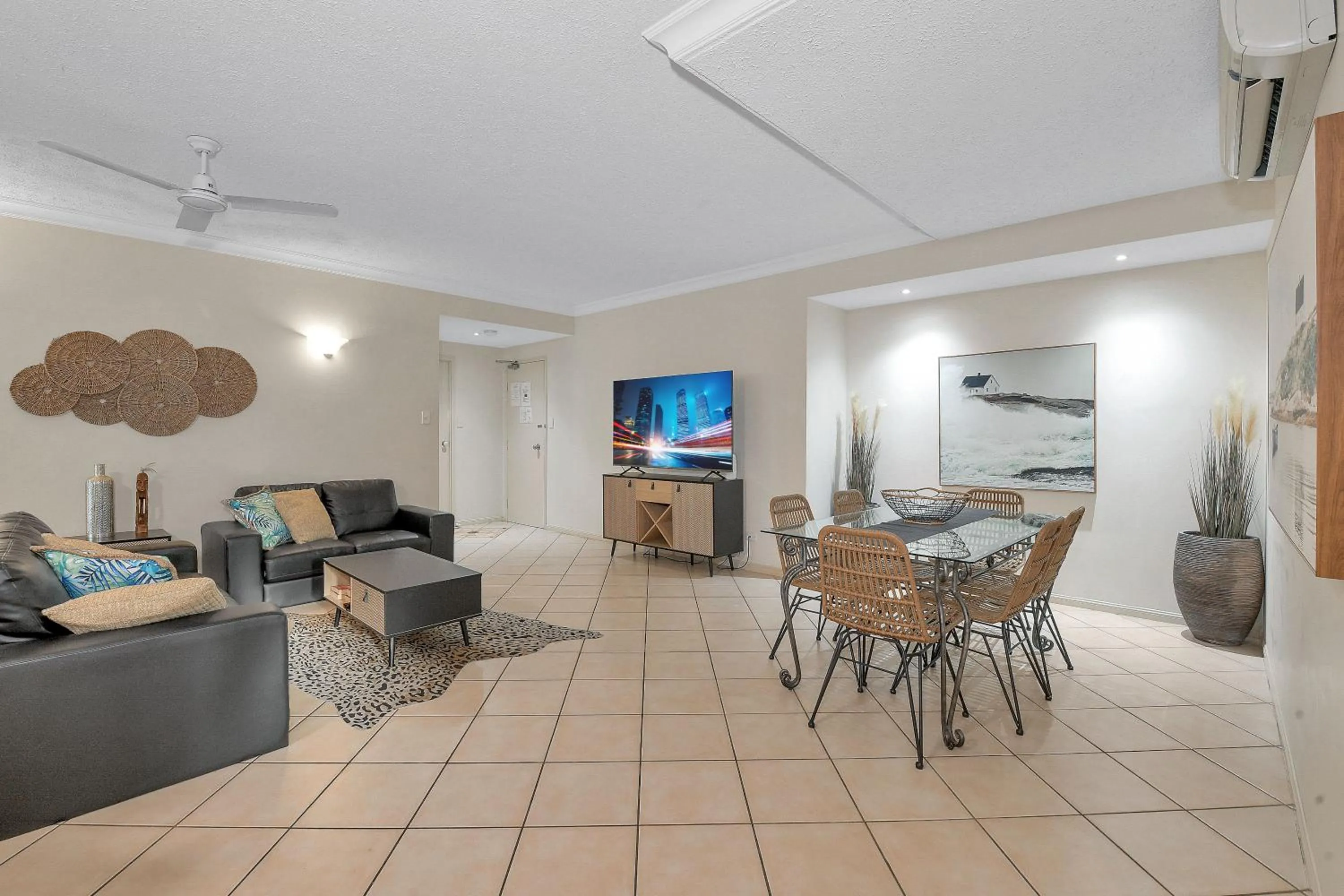 Communal lounge/ TV room in The Lakes Resort Cairns