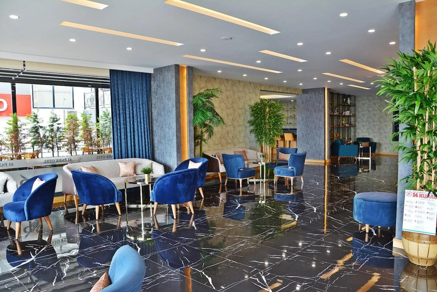 Communal lounge/ TV room in 61 Park Hotel