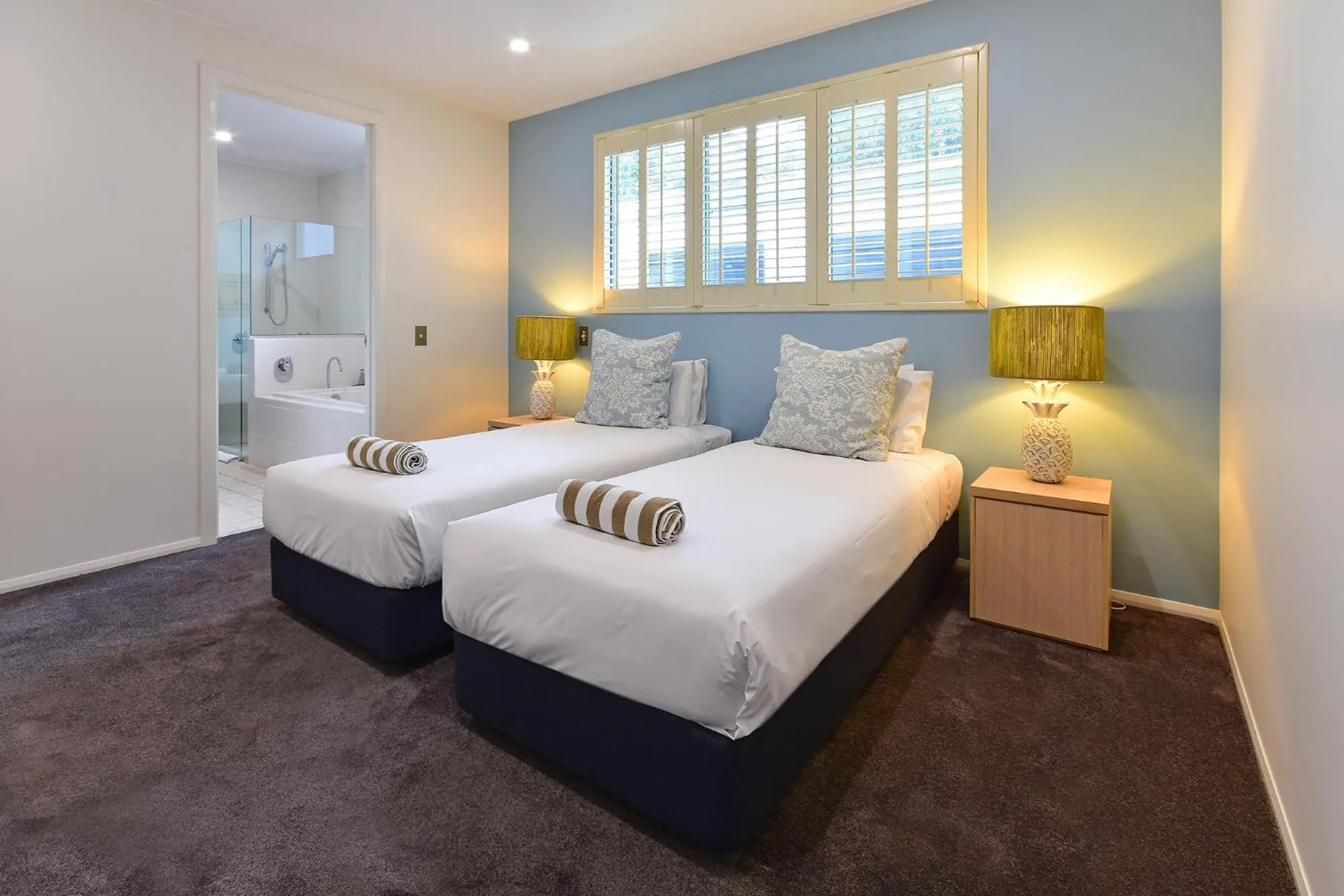 Bed in Hamilton Island Holiday Homes
