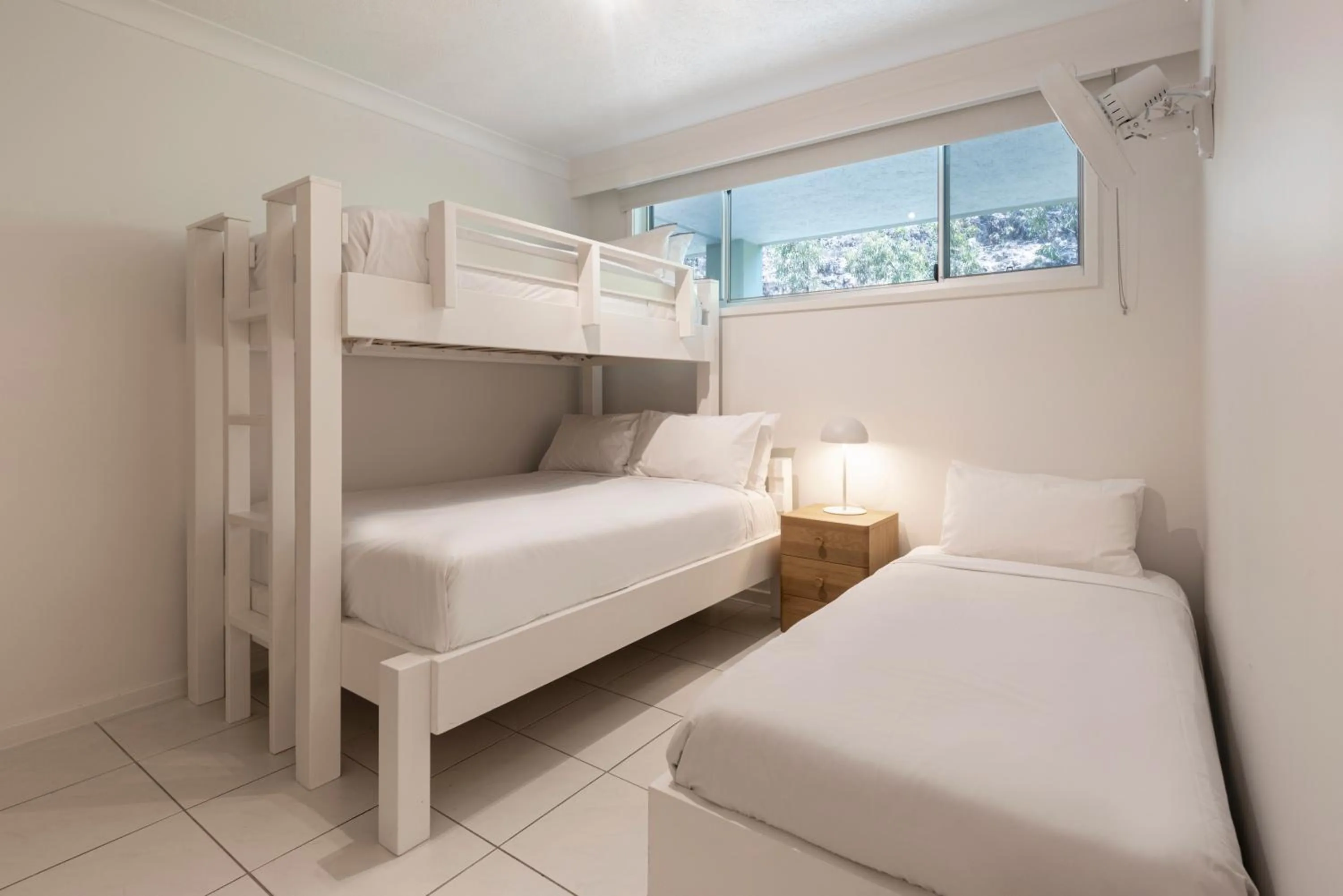 Bed in Hamilton Island Holiday Homes
