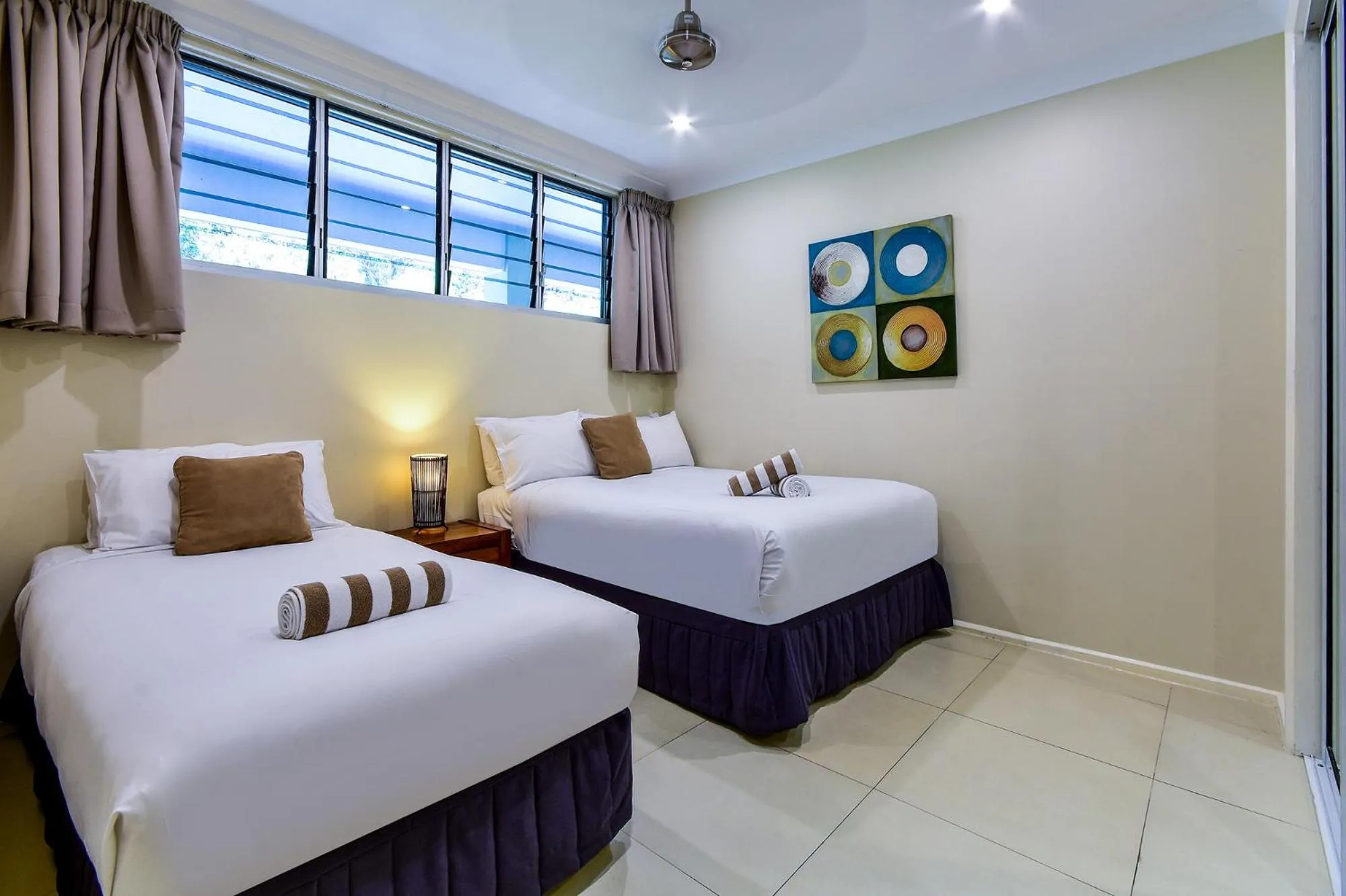 Bed in Hamilton Island Holiday Homes