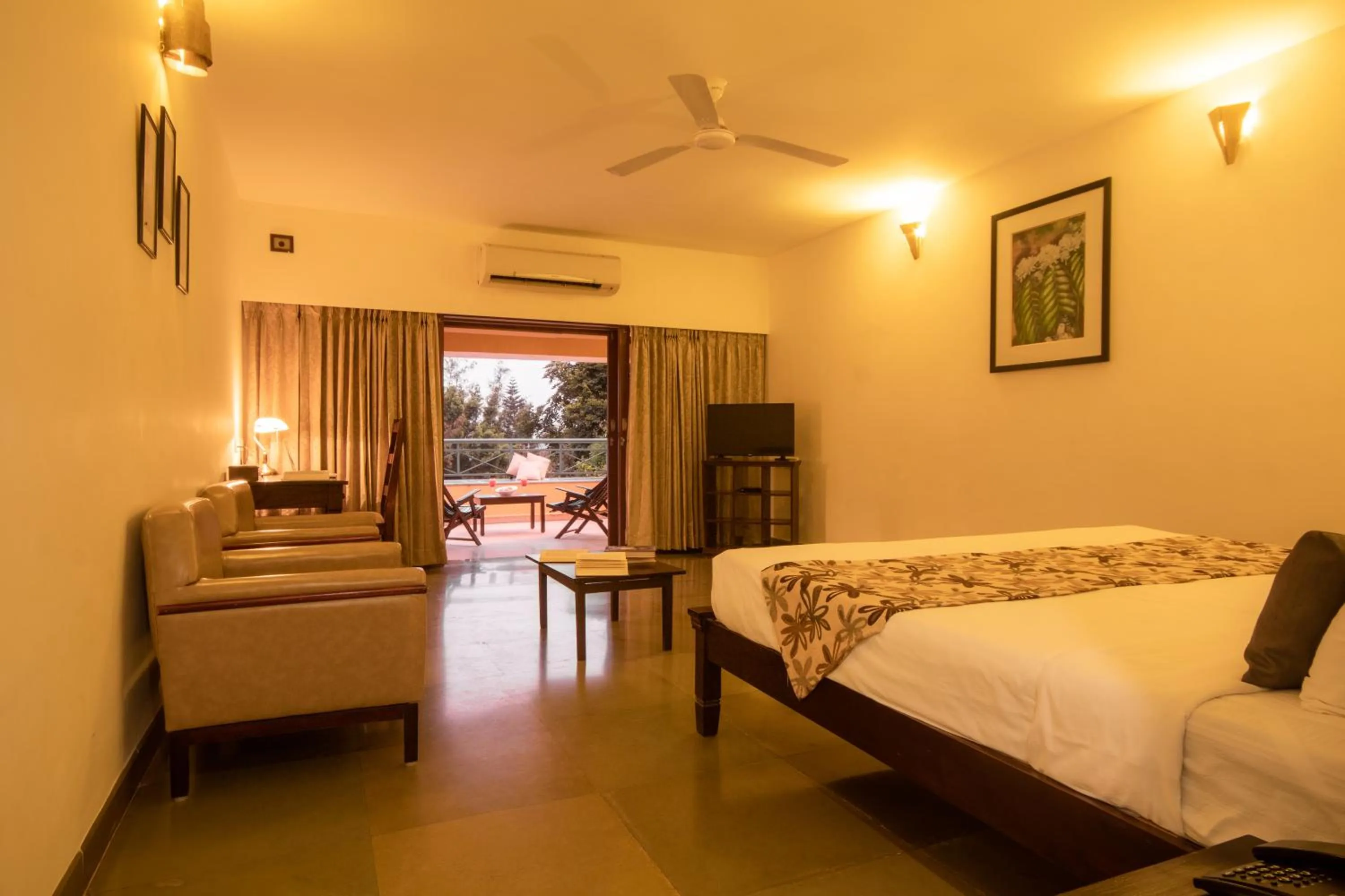 Photo of the whole room, Bed in Amritara Ambatty Greens Resort