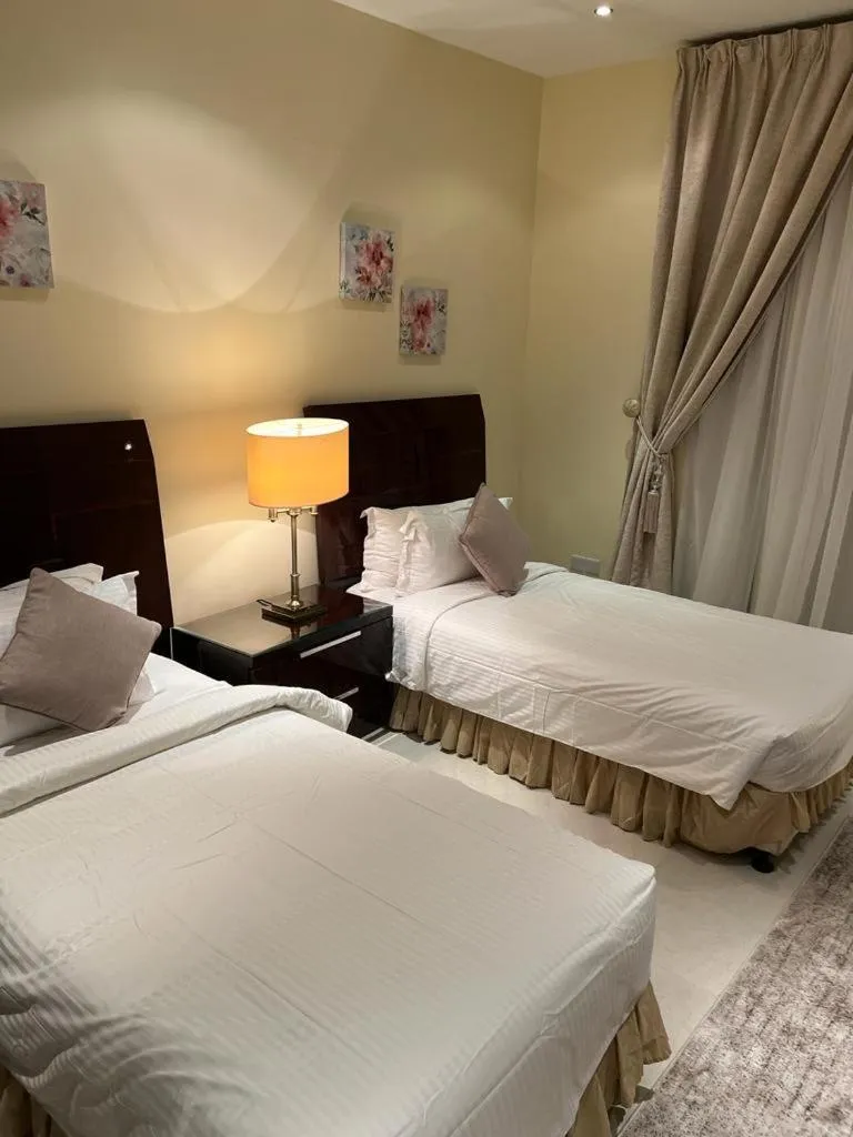Bed in Al Gosaibi Hotel - Villa