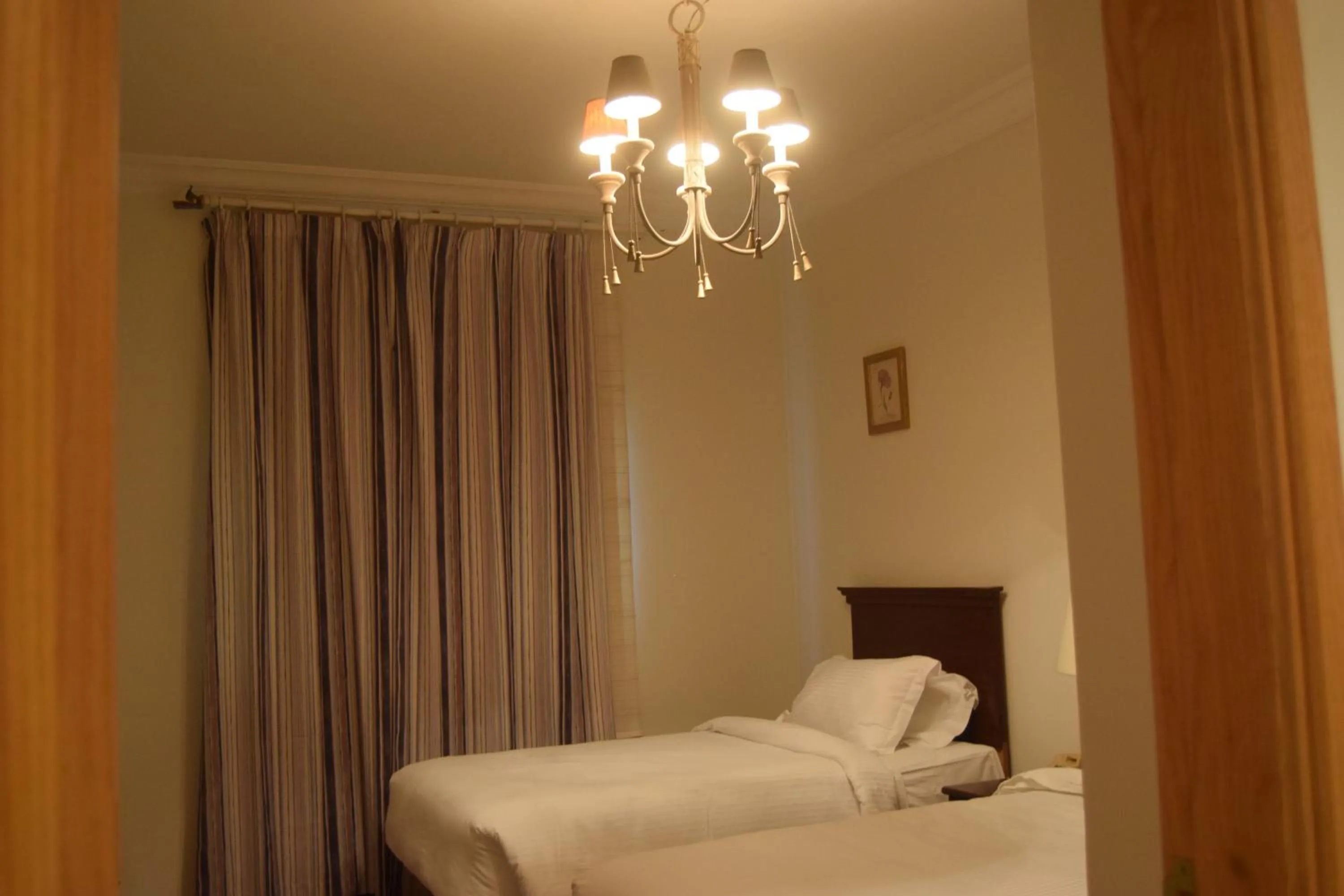 Bed in Al Gosaibi Hotel - Villa