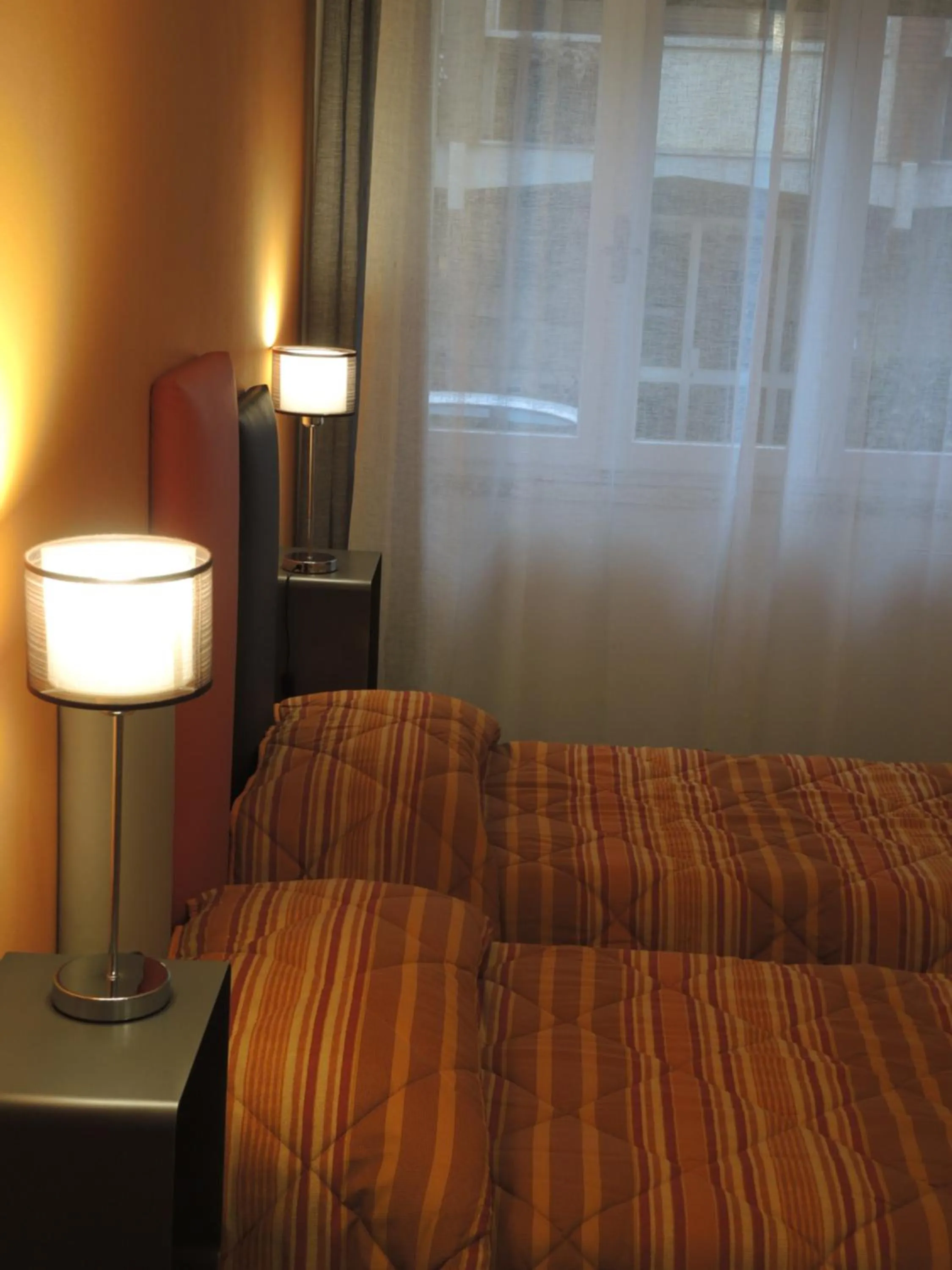 Bed in B&B Ariston Pisa Tower