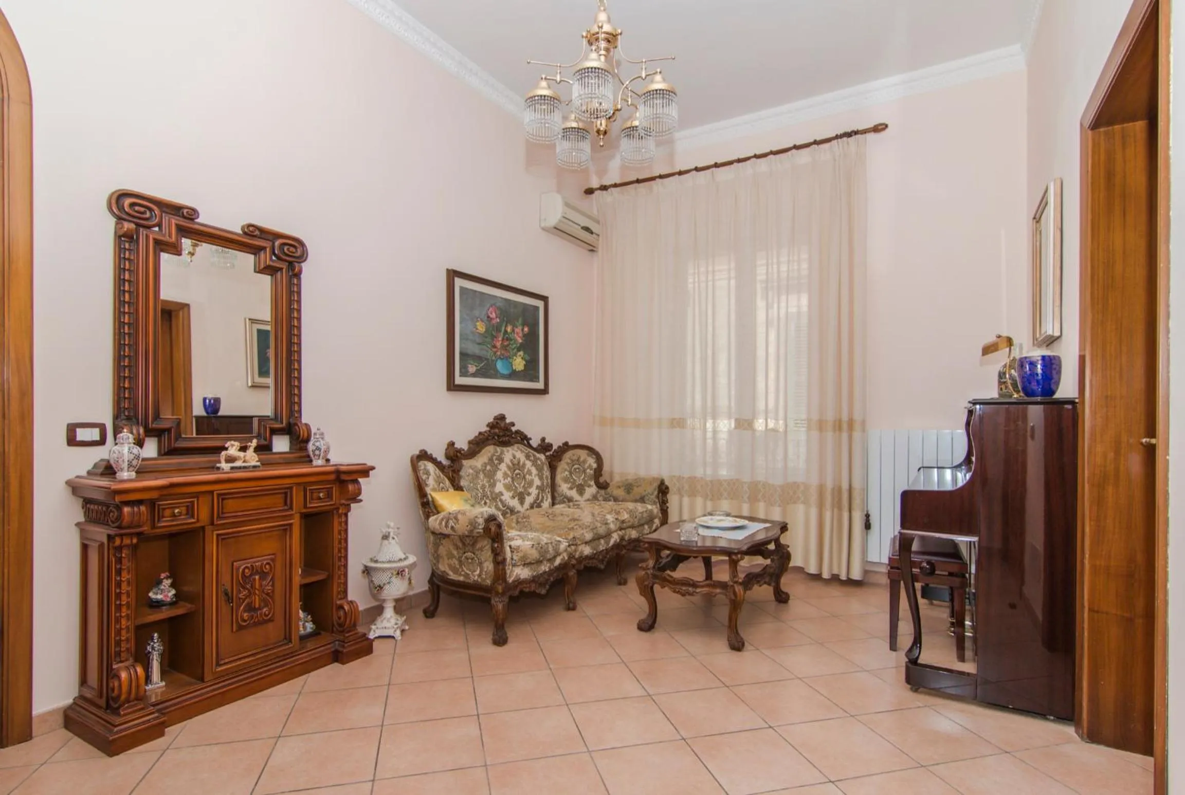 Communal lounge/ TV room in B&B Il Giardino Dei Mandarini