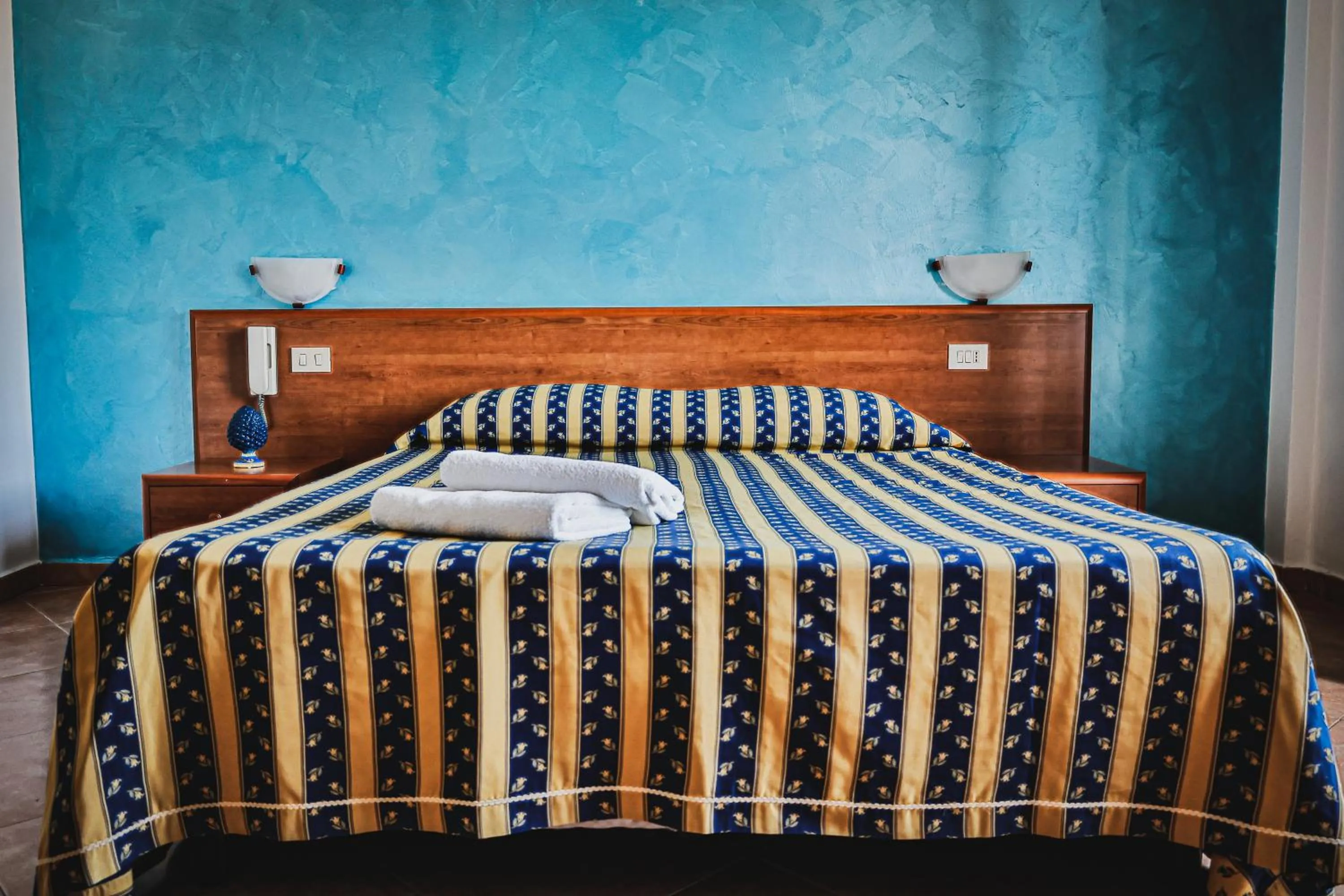 Bed in Hotel Alexander