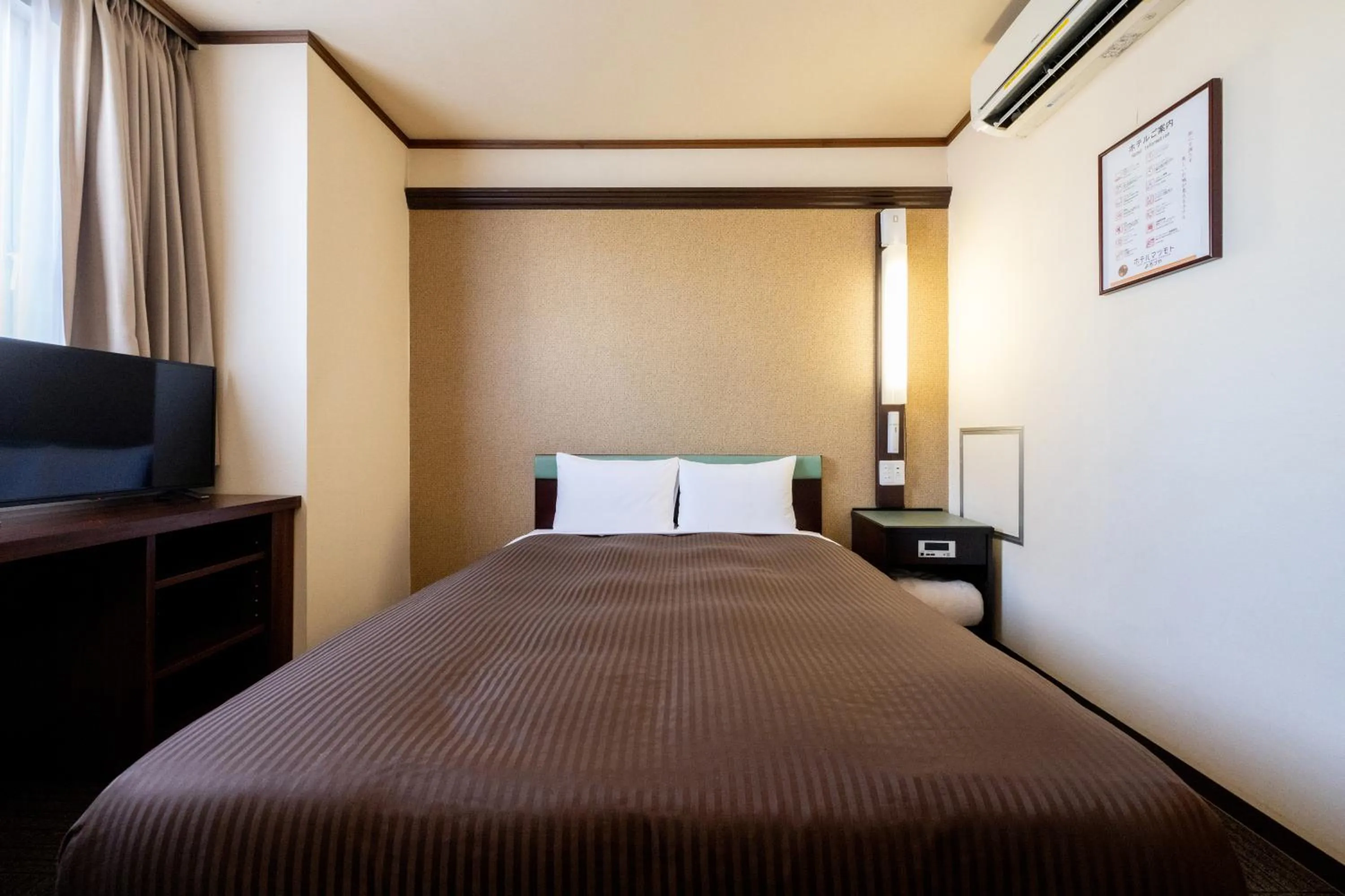 Photo of the whole room, Bed in Hotel Matsumoto Yorozuya