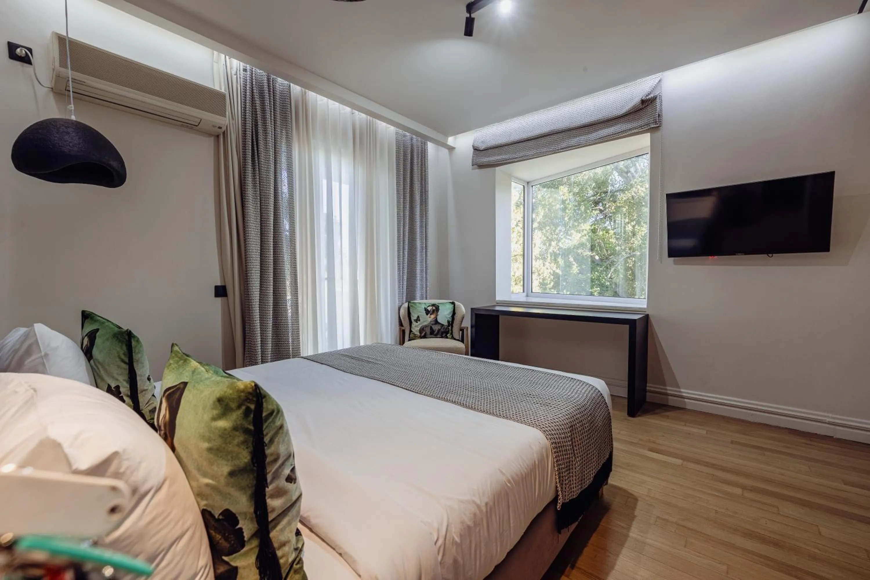 Bed in Mikelina Boutique Hotel