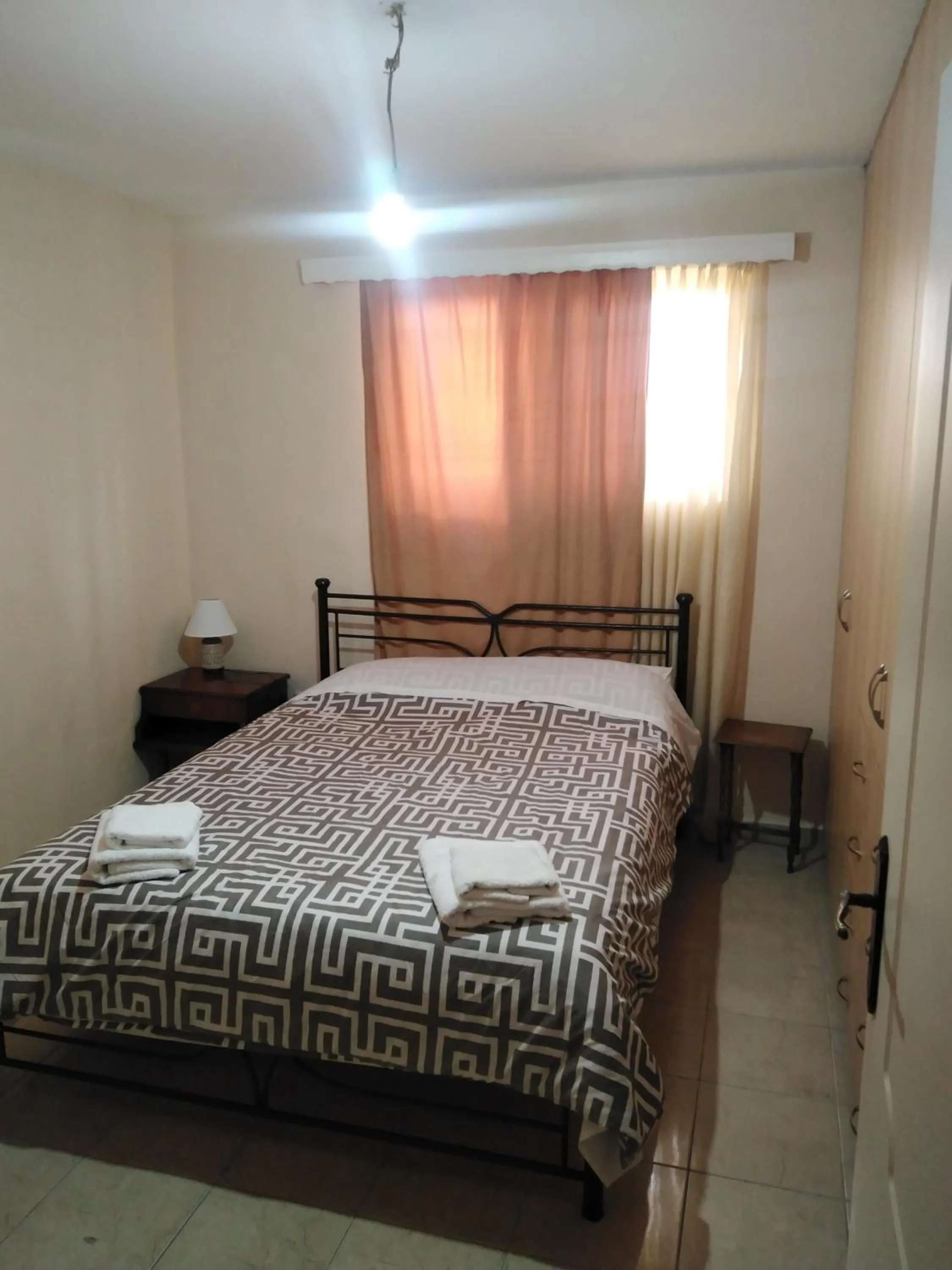 Bed in Stavros Apartments