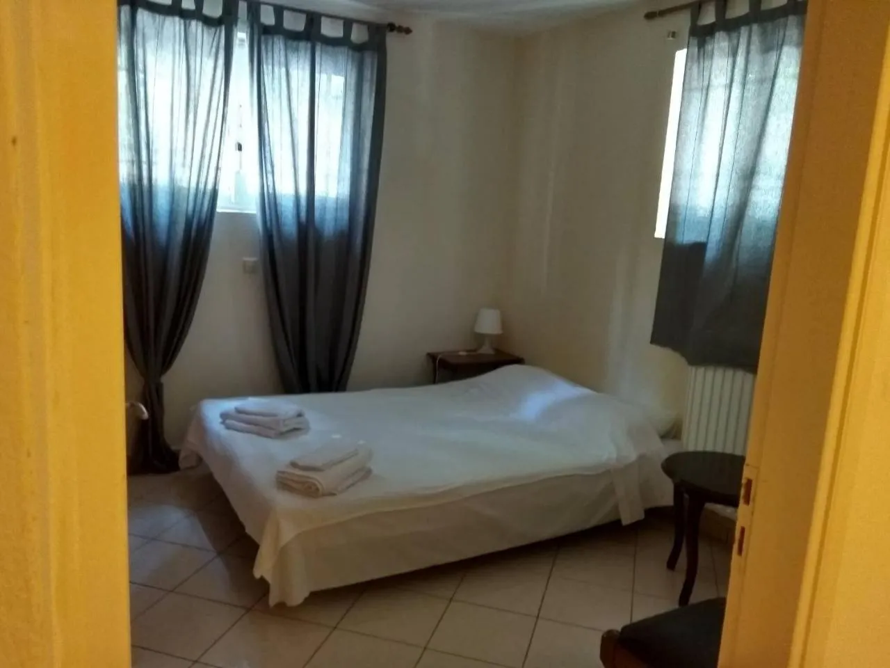 Bed in Stavros Apartments