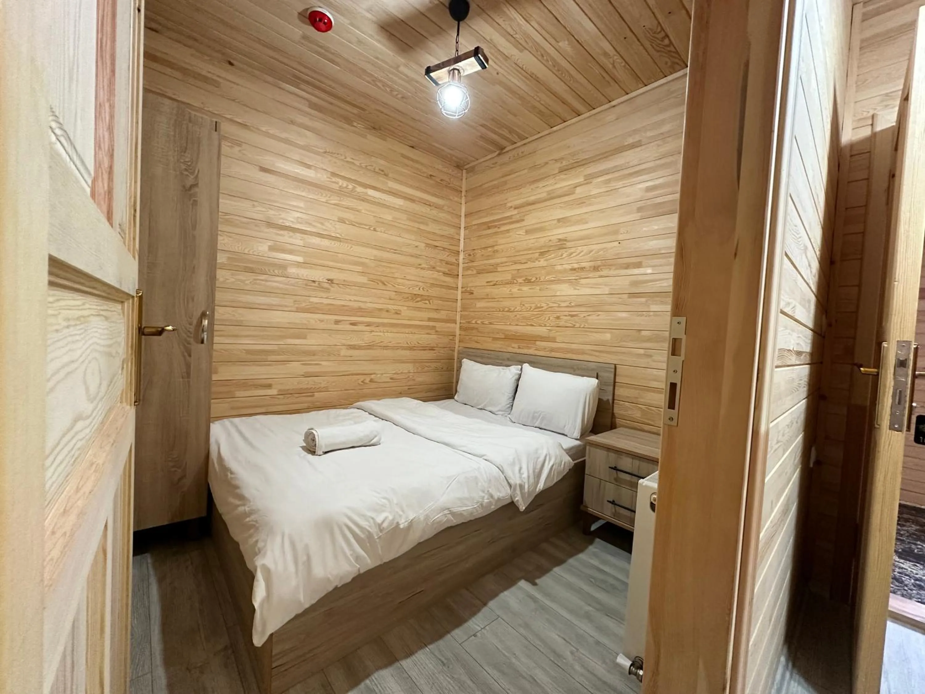 Bed in Haros Suite Hotel