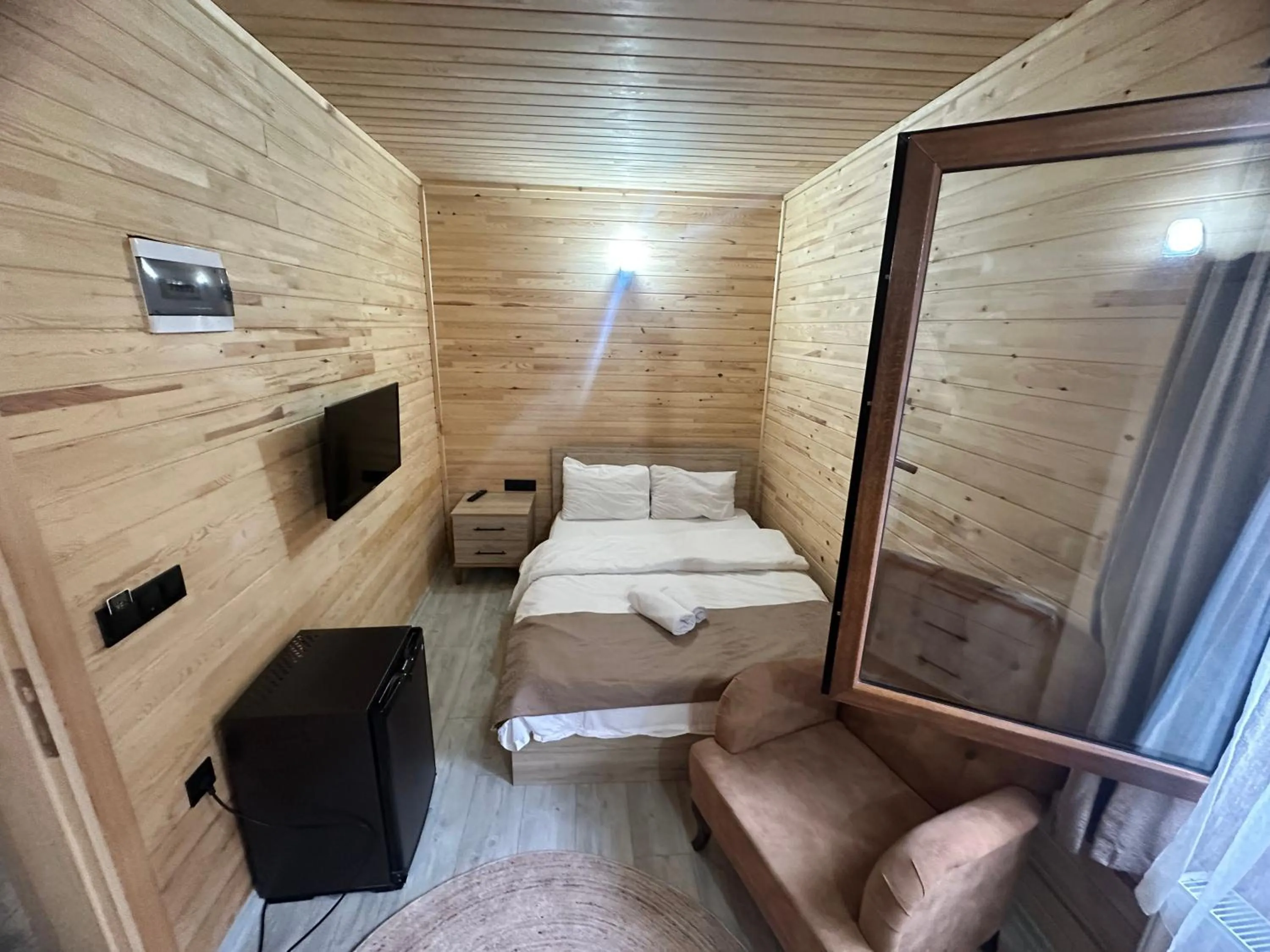 Bed in Haros Suite Hotel