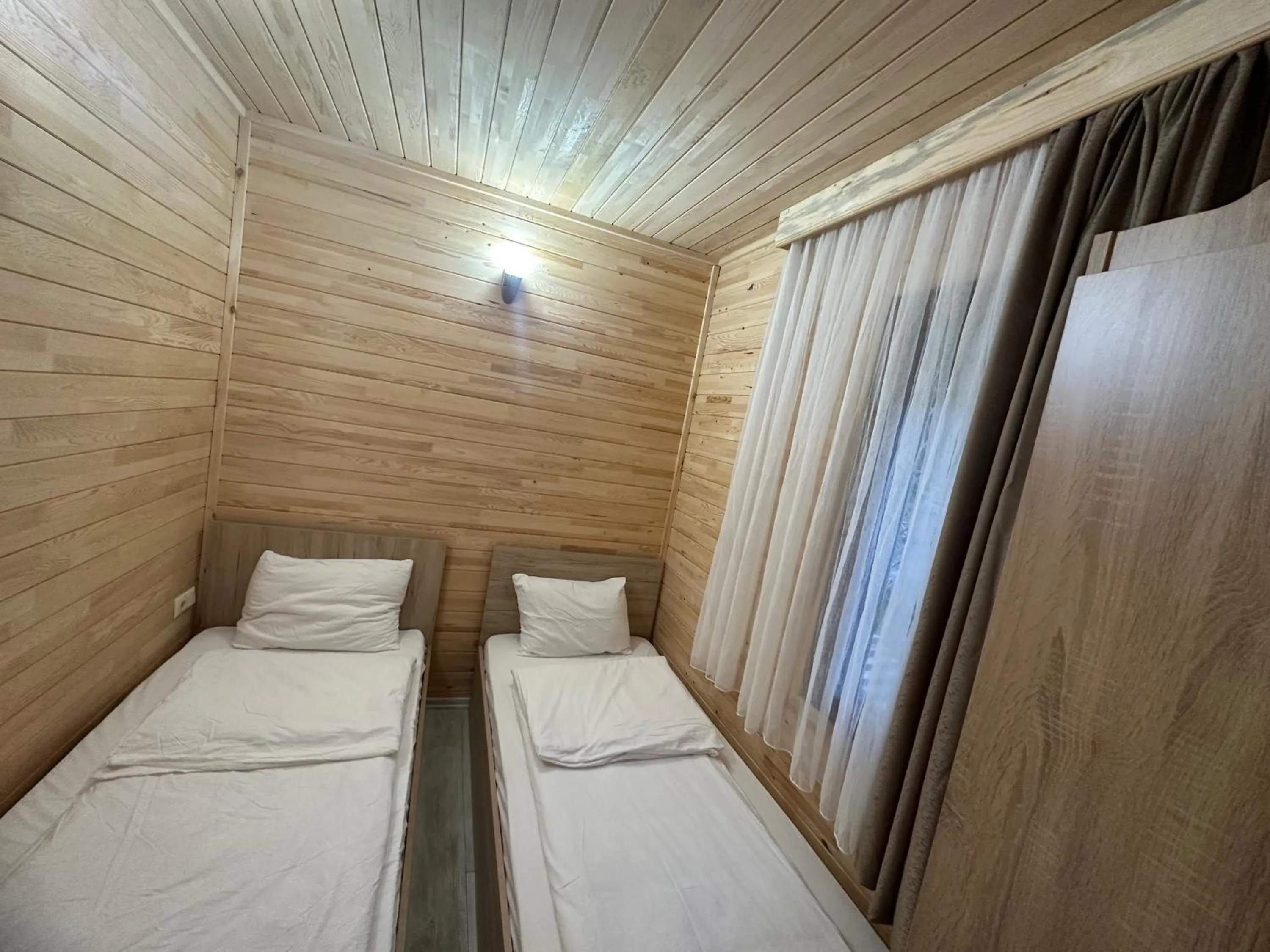 Bed in Haros Suite Hotel