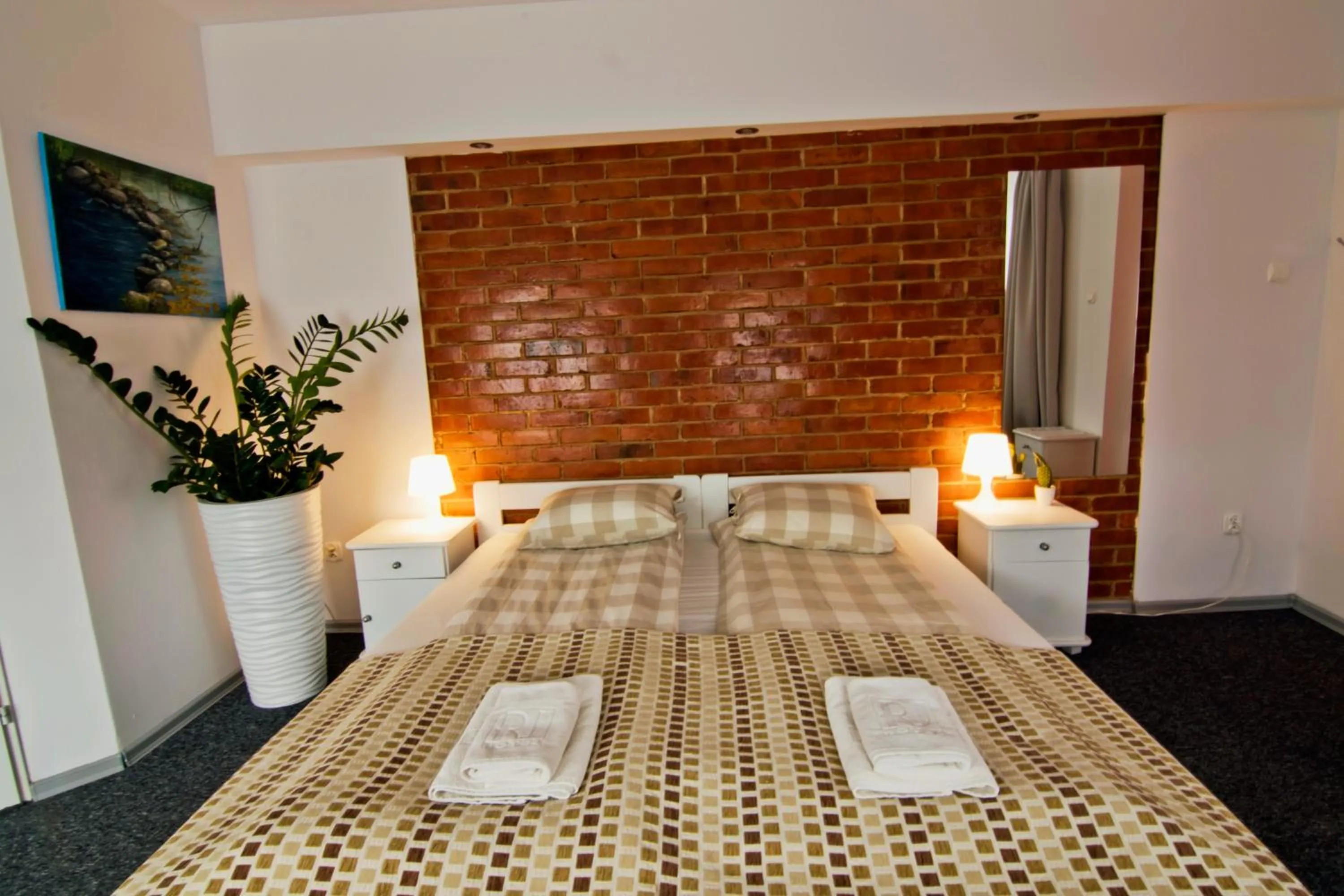 Photo of the whole room, Bed in RJ Hotel