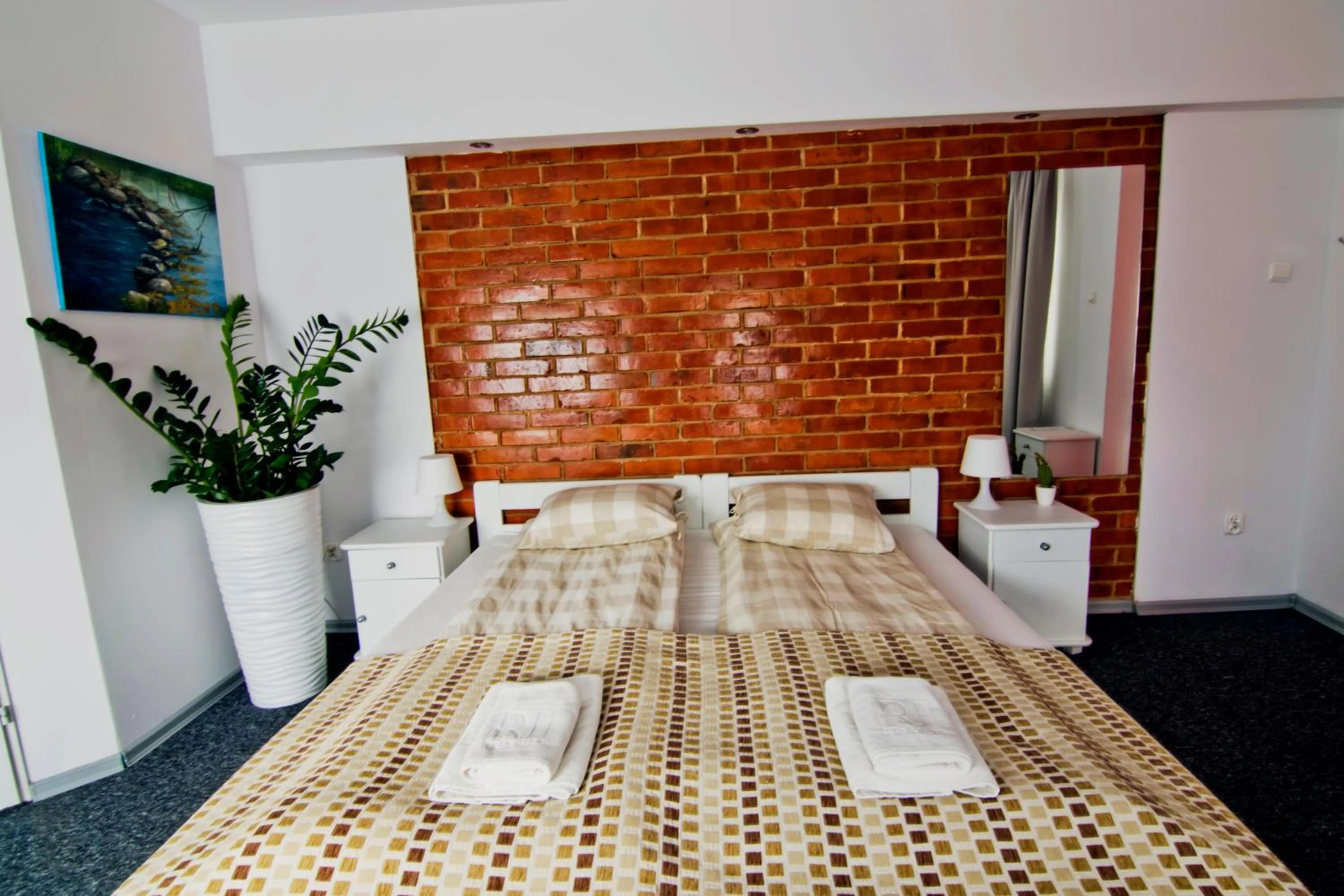 Photo of the whole room, Bed in RJ Hotel