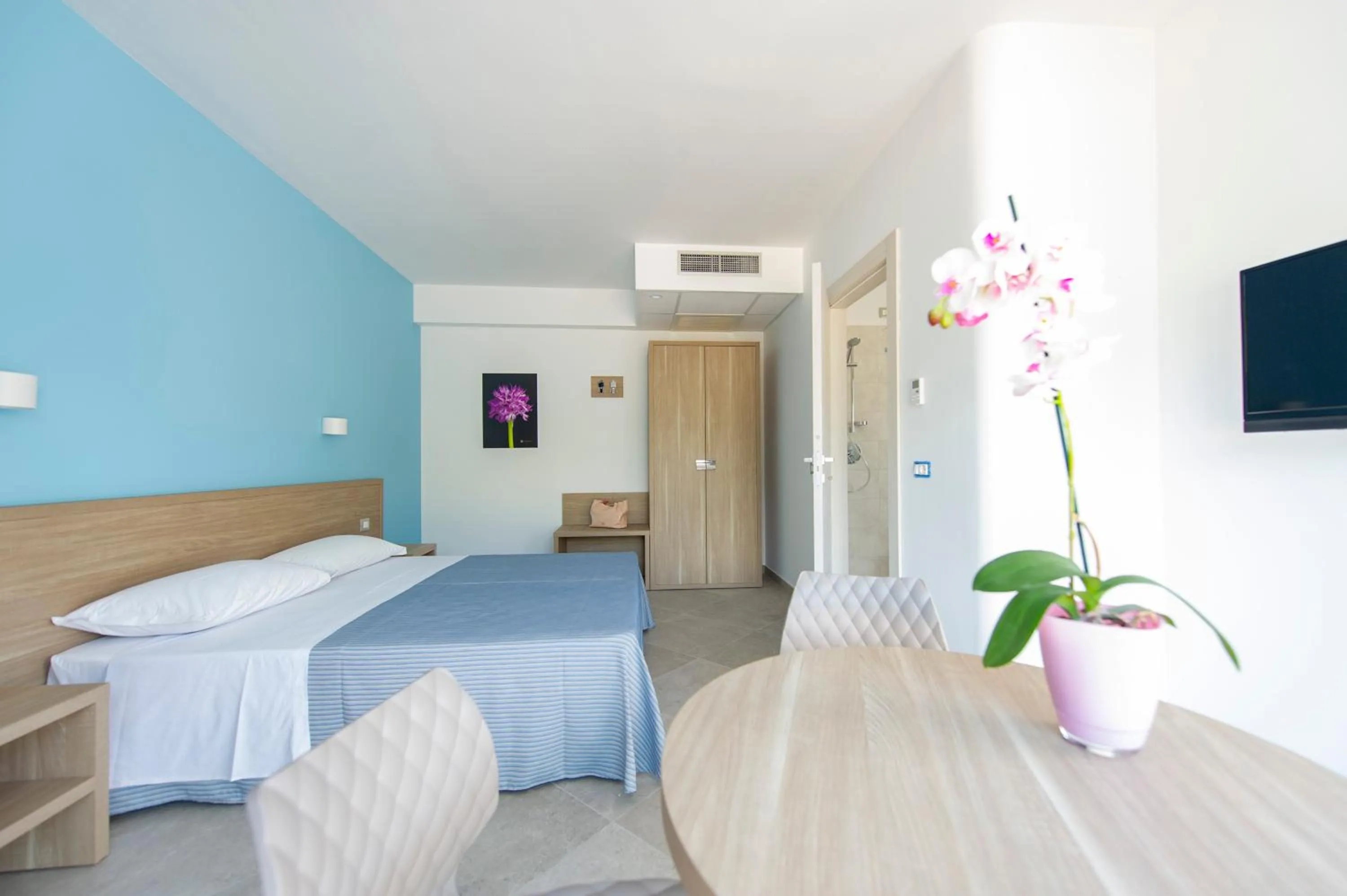 Living room, Bed in Hotel Residence Torre Del Porto