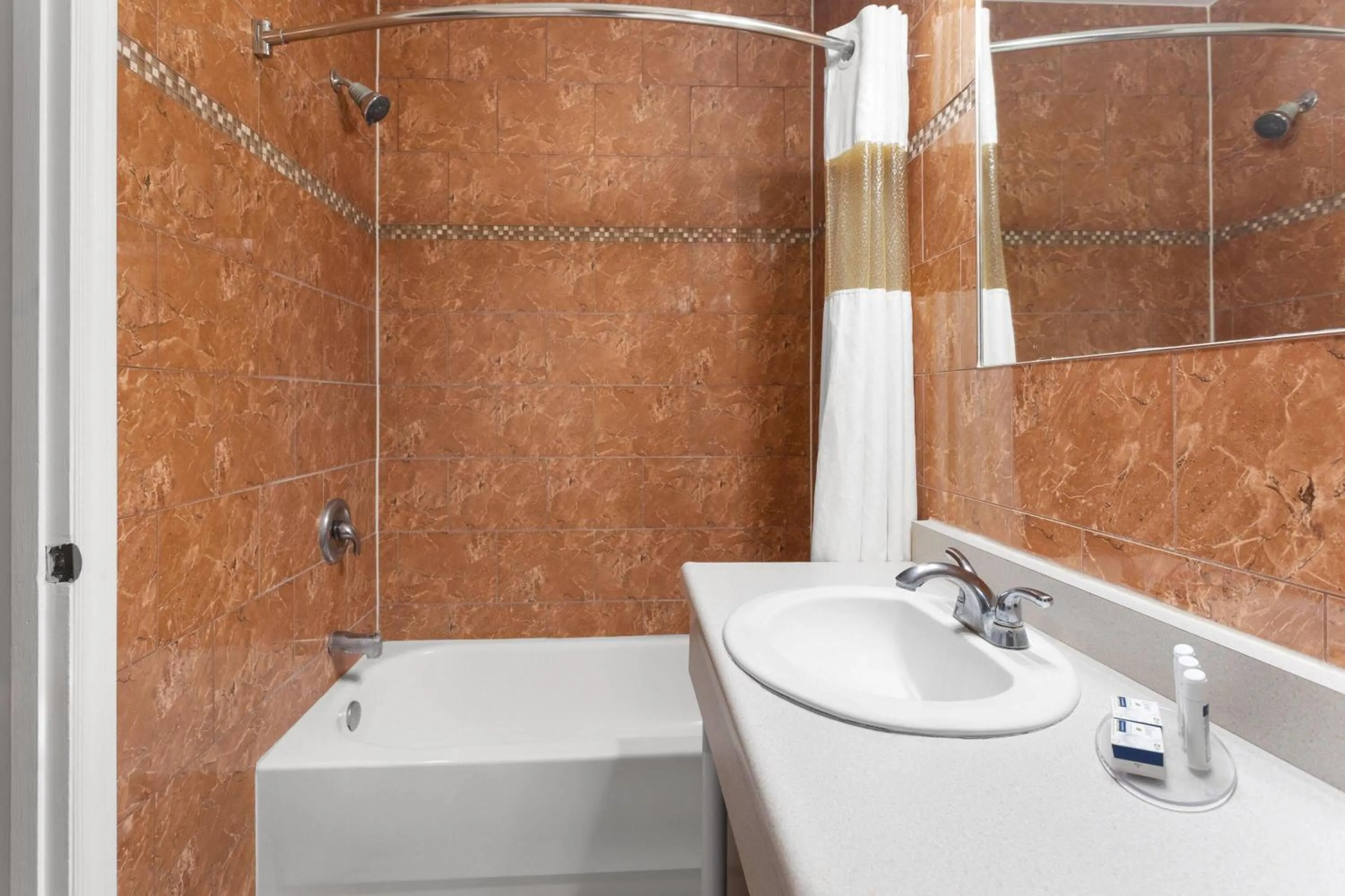 Bathroom in Travelodge by Wyndham Lindsay