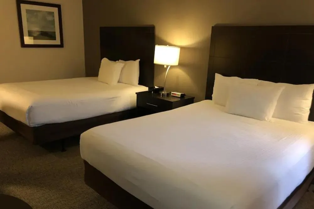 Bed in Ramada by Wyndham Lindsay