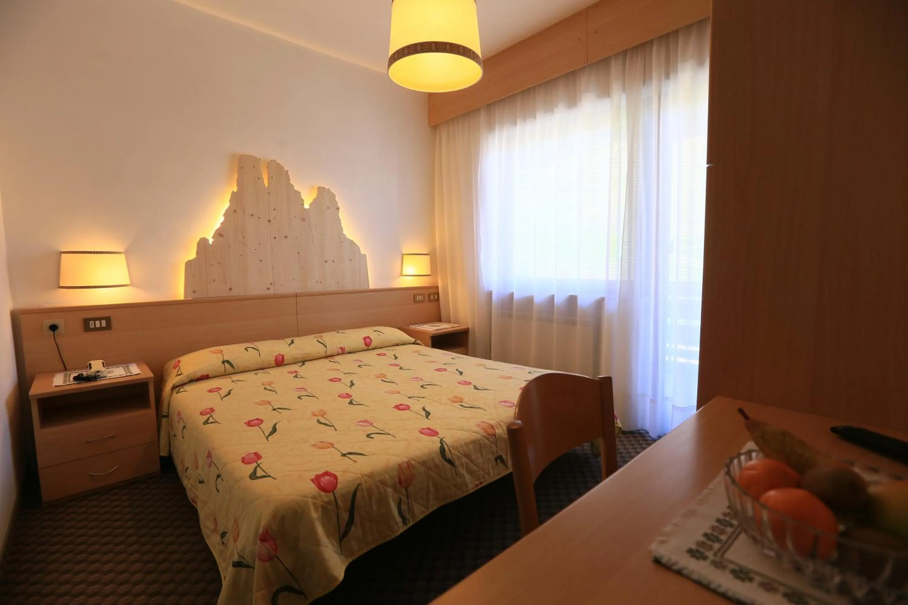 Bed in Hotel Miramonti