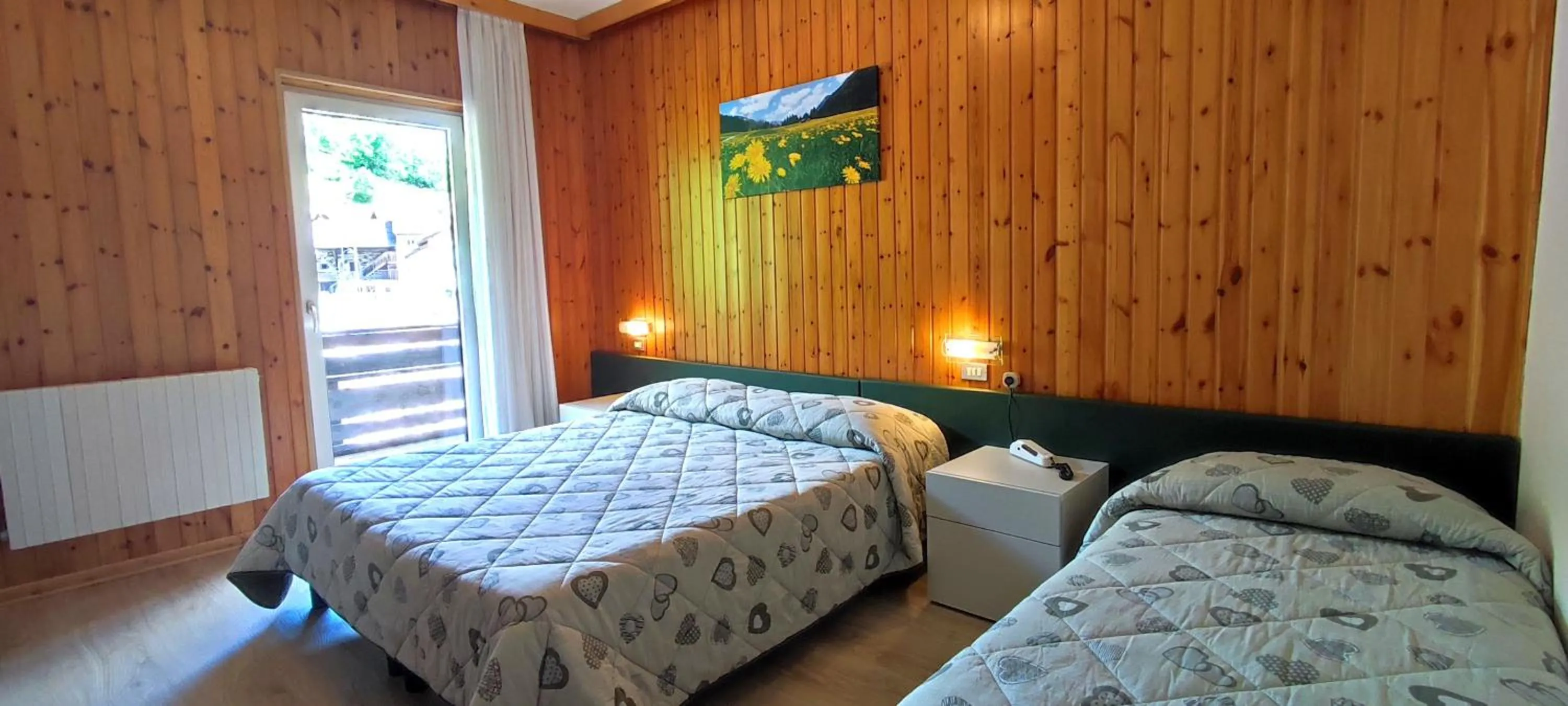 Bed in Hotel Miramonti