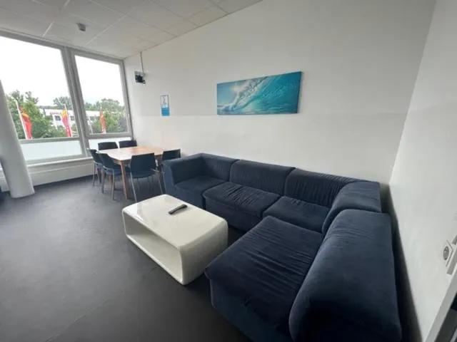 Communal lounge/ TV room in Arena Hostel & Monteurzimmer