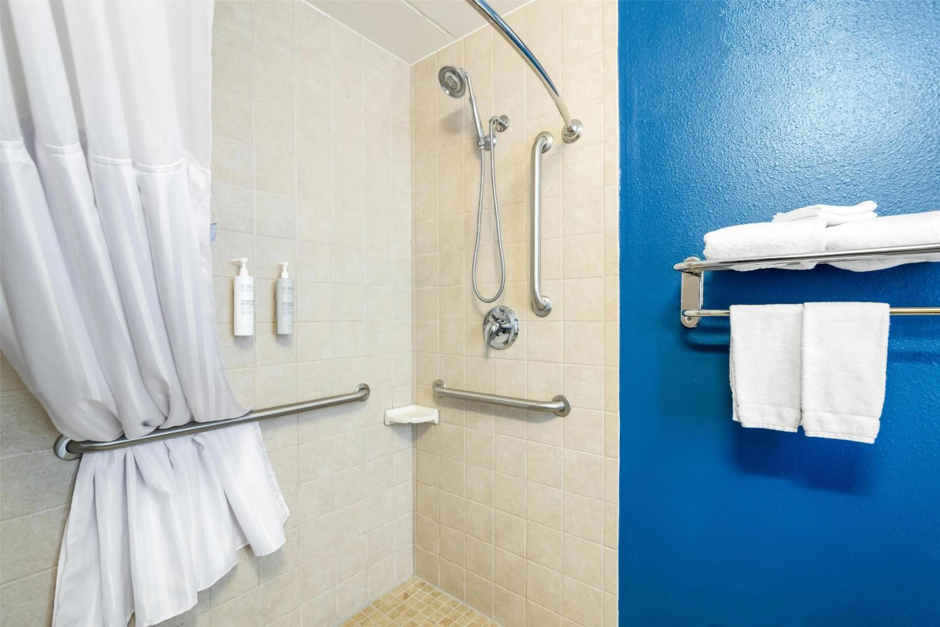 Bathroom in Spark by Hilton Roanoke Civic Center