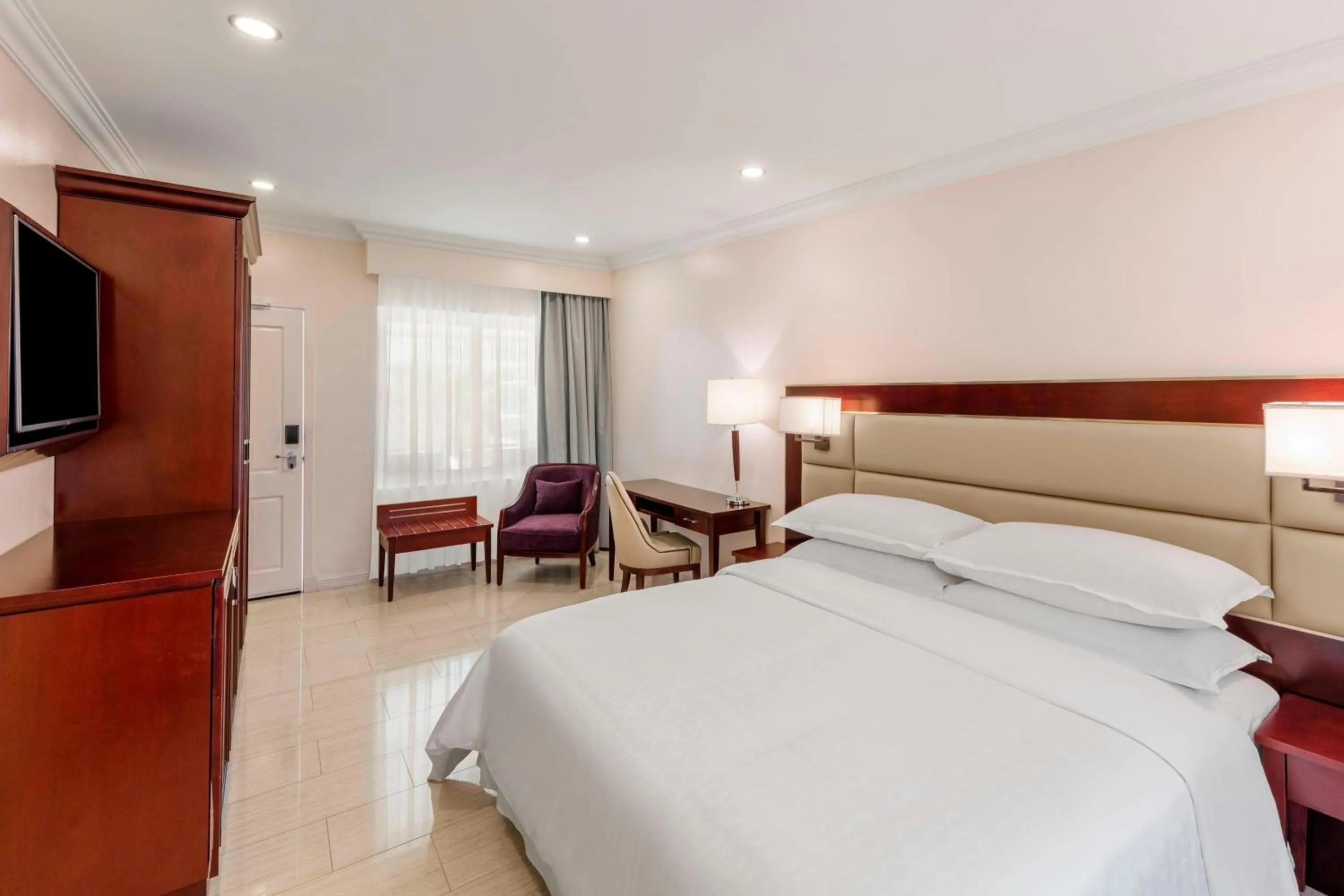 Photo of the whole room, Bed in Sheraton Samoa Aggie Grey's Hotel & Bungalows