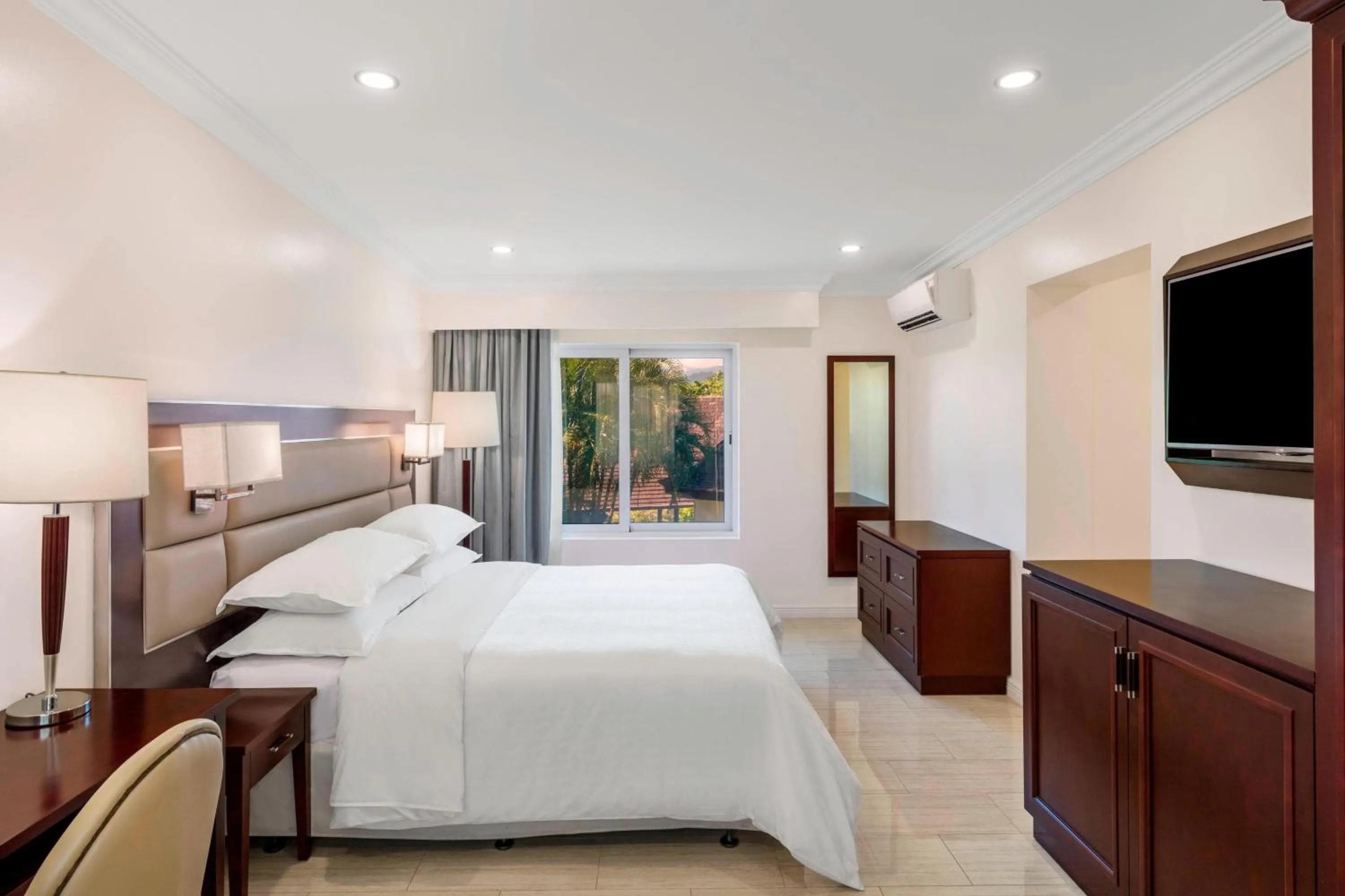 Photo of the whole room, Bed in Sheraton Samoa Aggie Grey's Hotel & Bungalows