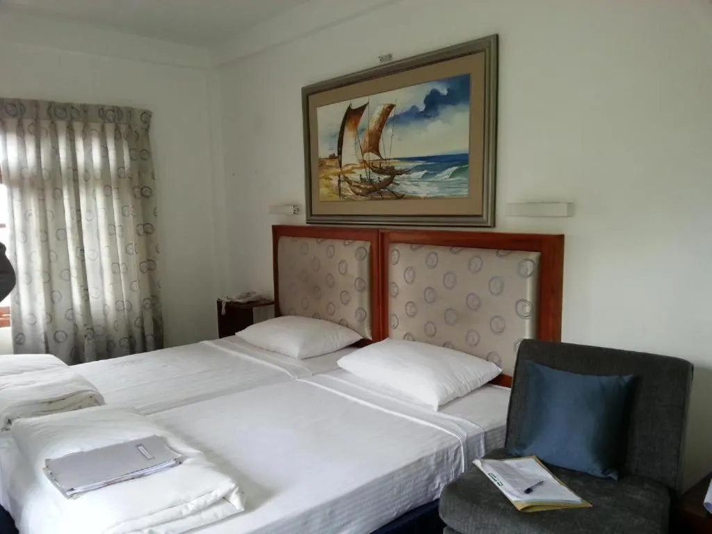 Bed in Tea Bush Hotel