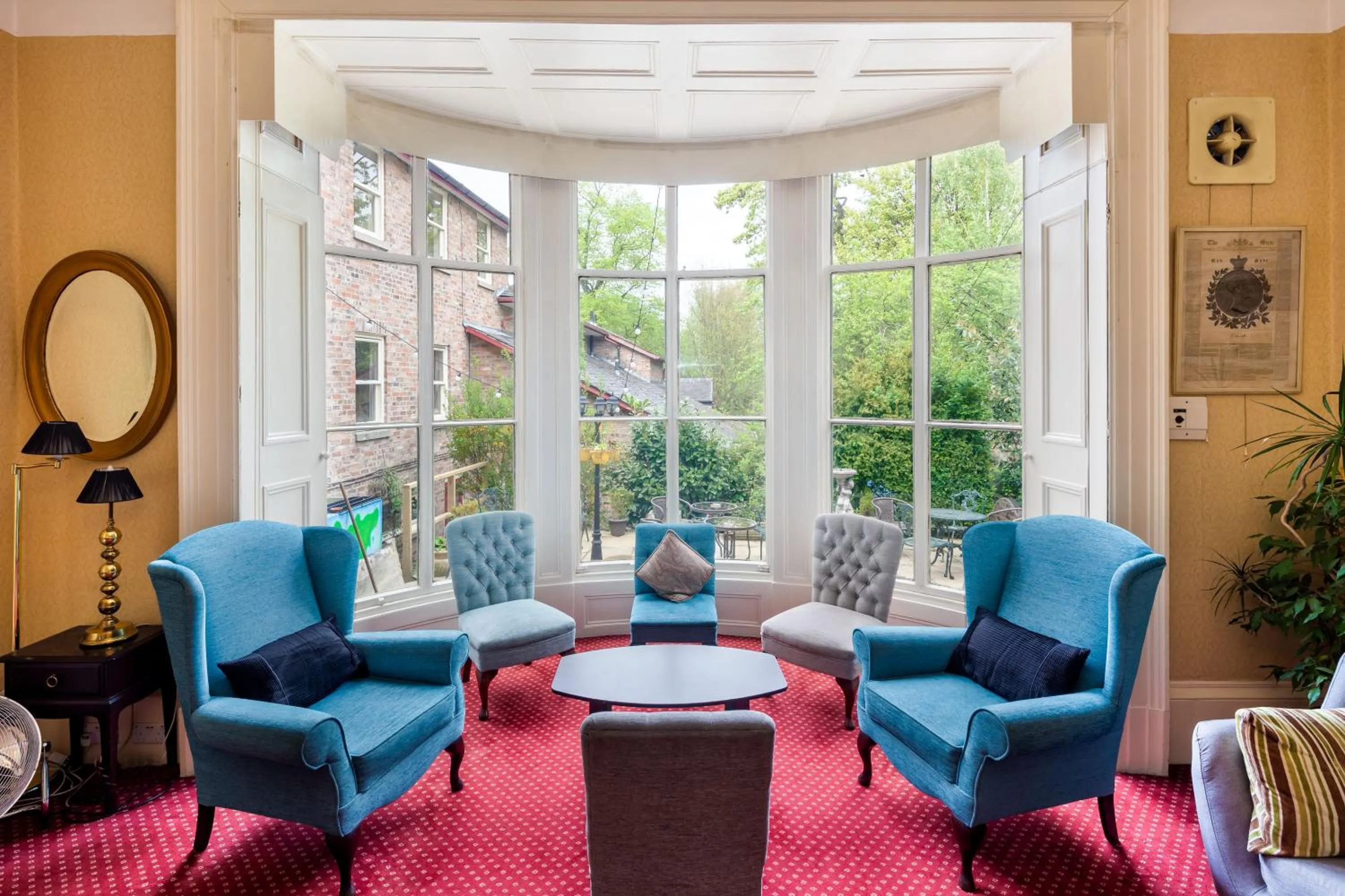 Living room in Astor York Hostel