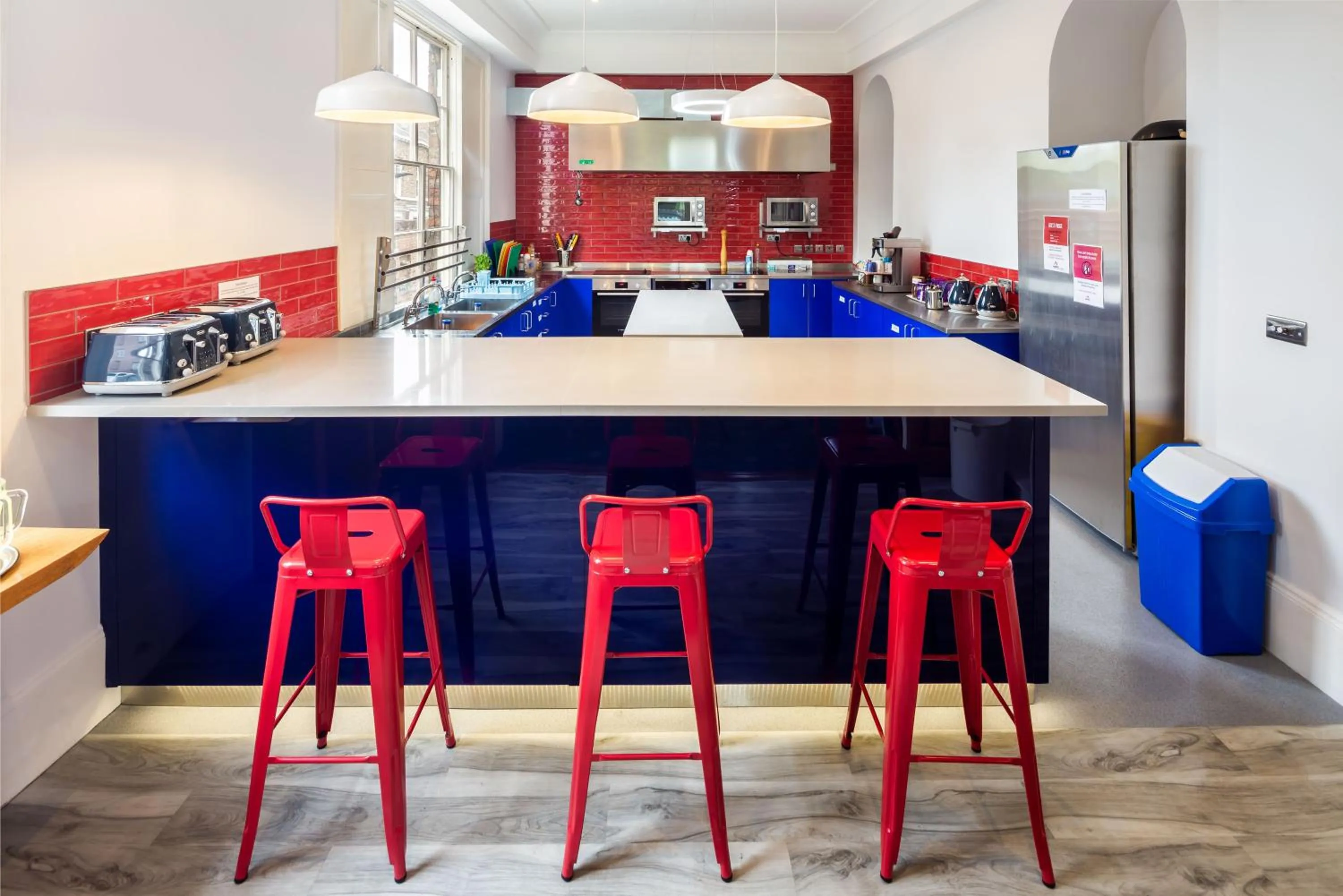 Communal kitchen in Astor York Hostel