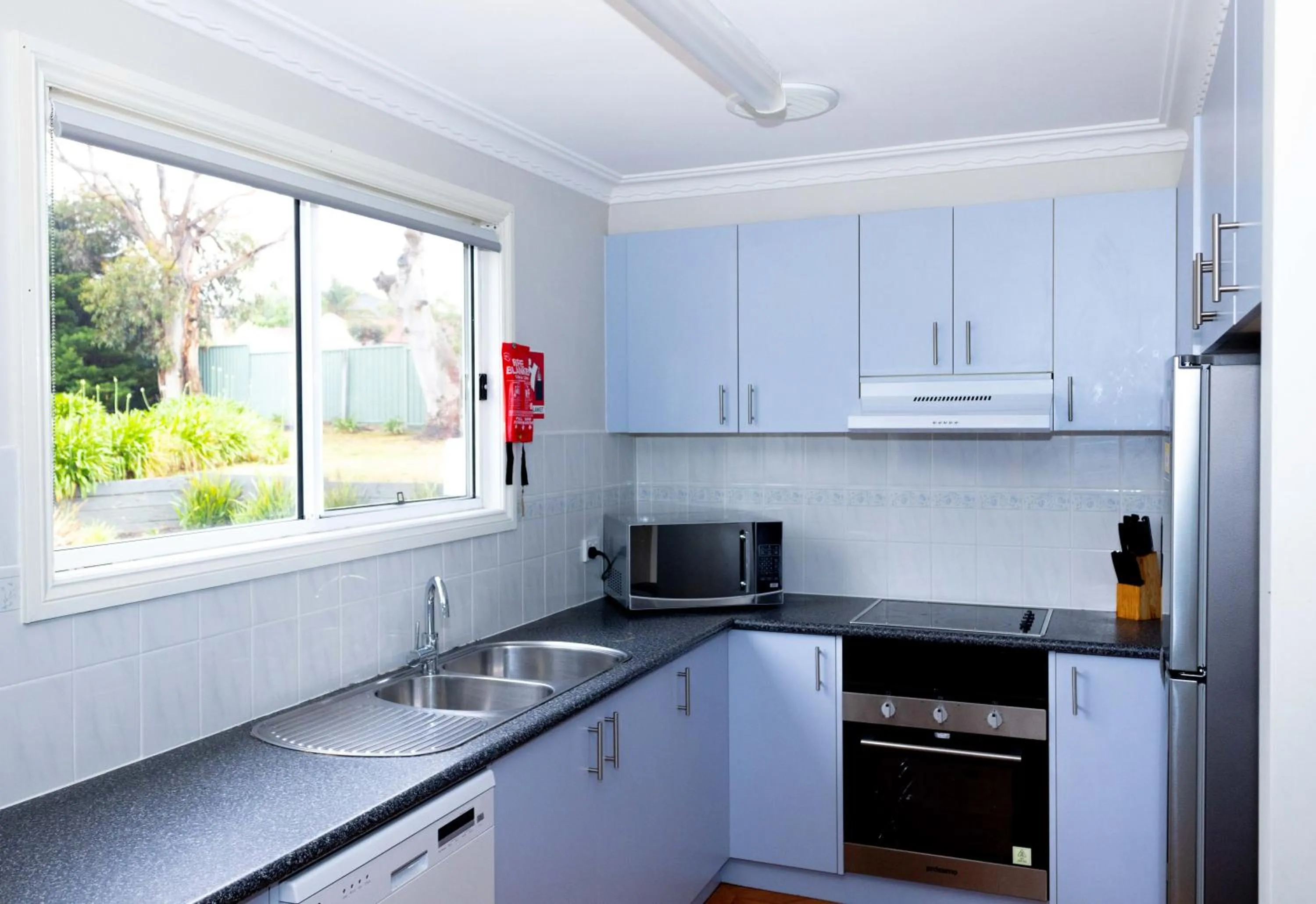 kitchen in Airport Tourist Village Melbourne