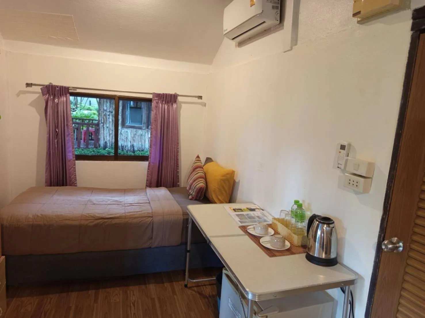 Bed in Faye Orchid Garden Resort