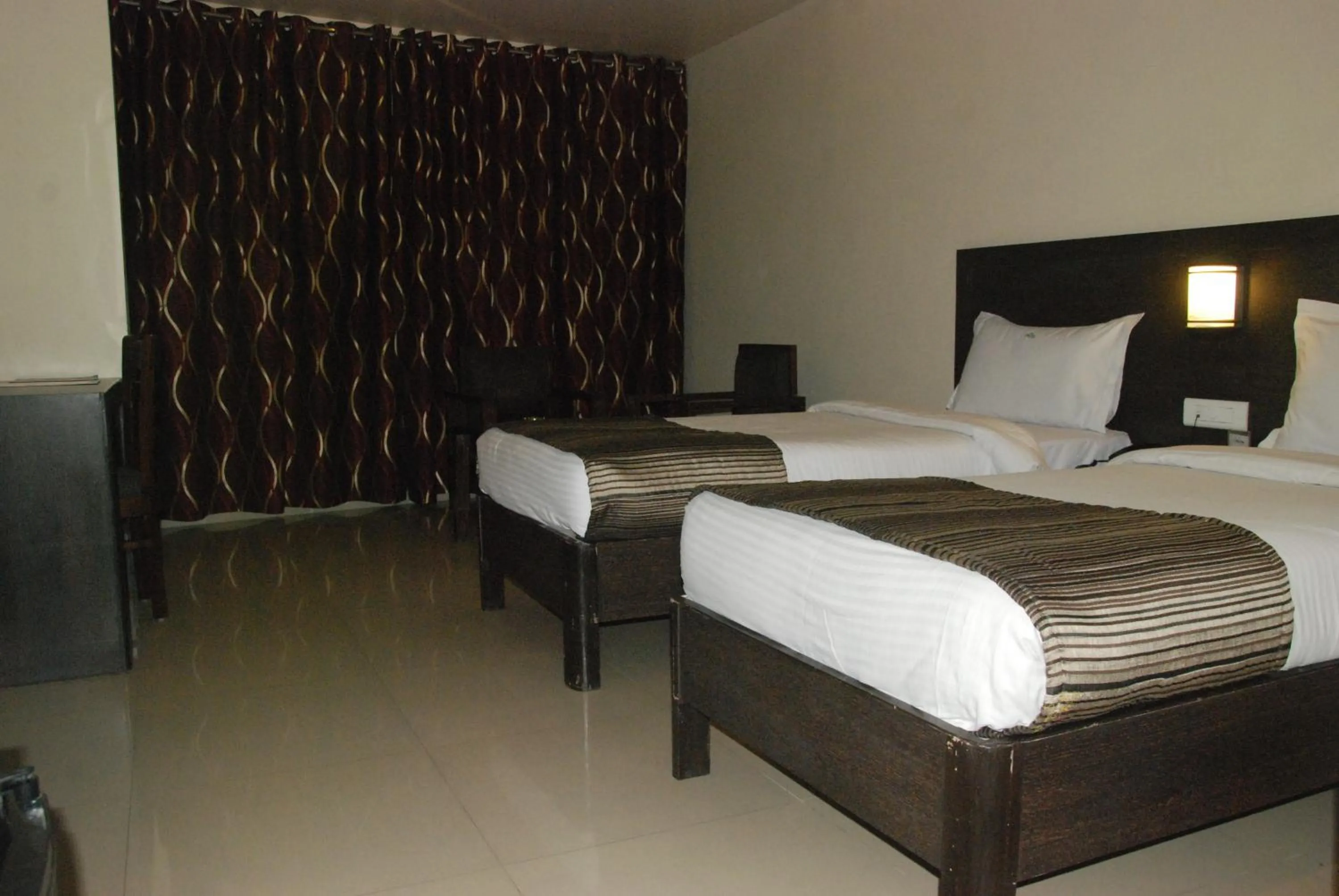 Bed in Hotel City Inn