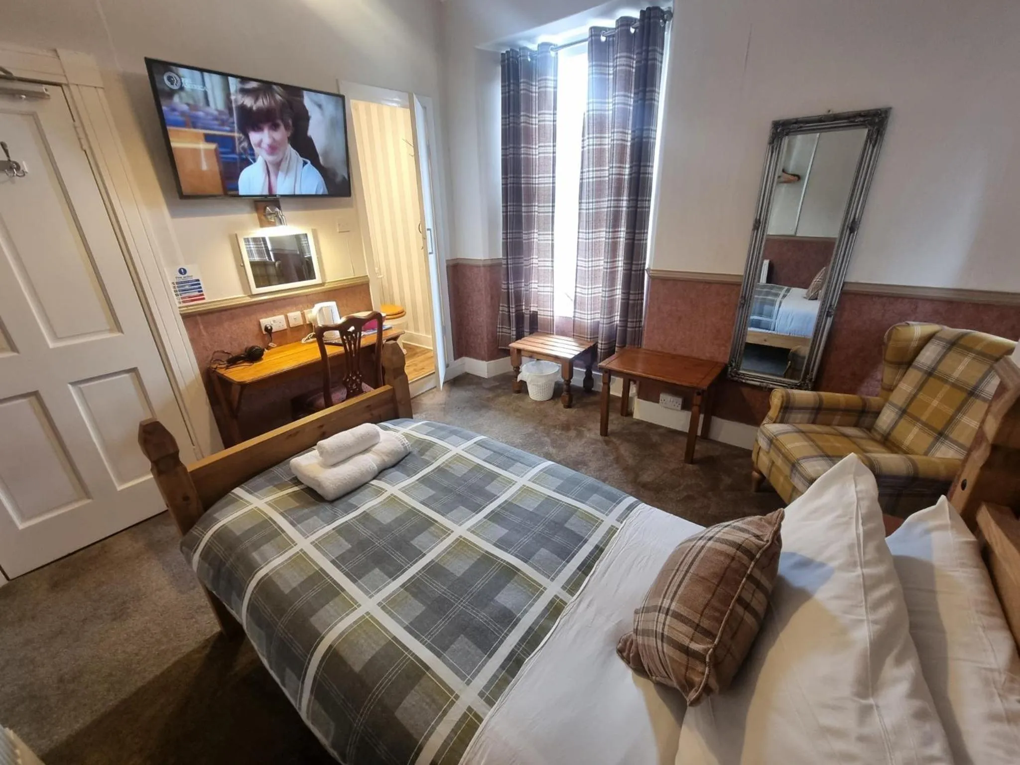 Bedroom in Roy Bridge Hotel