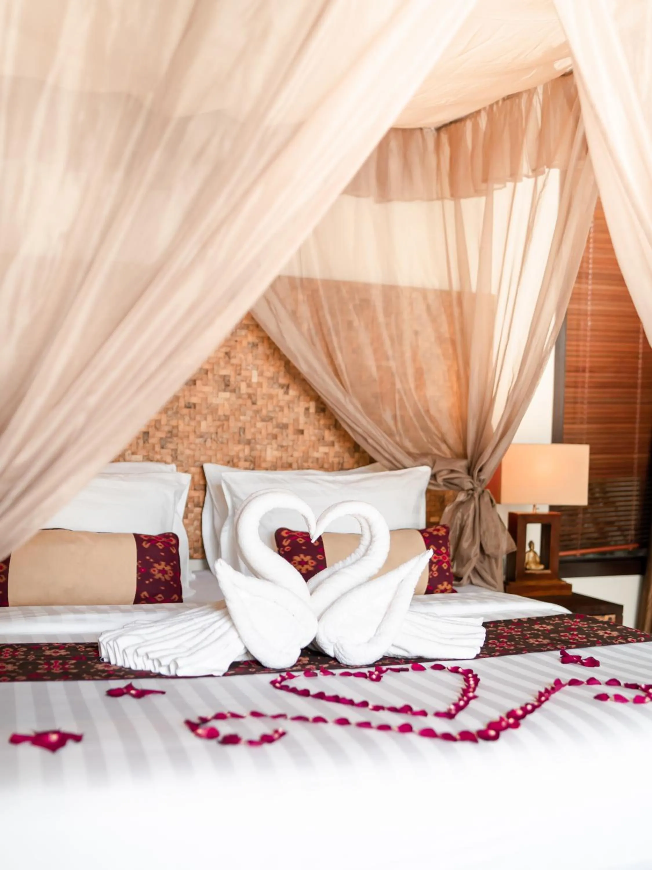 Bed in Mahagiri Villas & Spa Dreamland