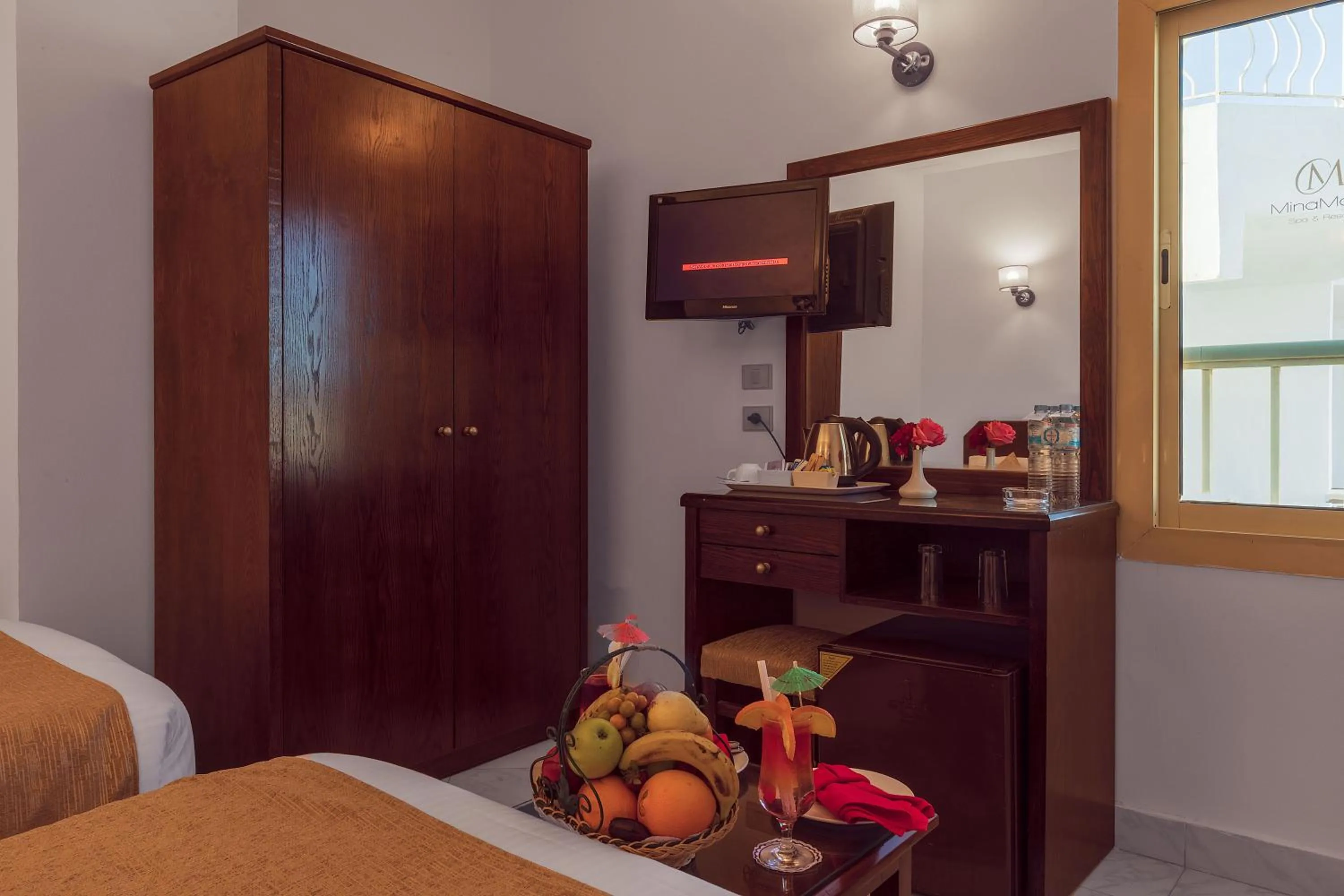 Coffee/tea facilities, Bed in MinaMark Beach Resort for Families and Couples Only