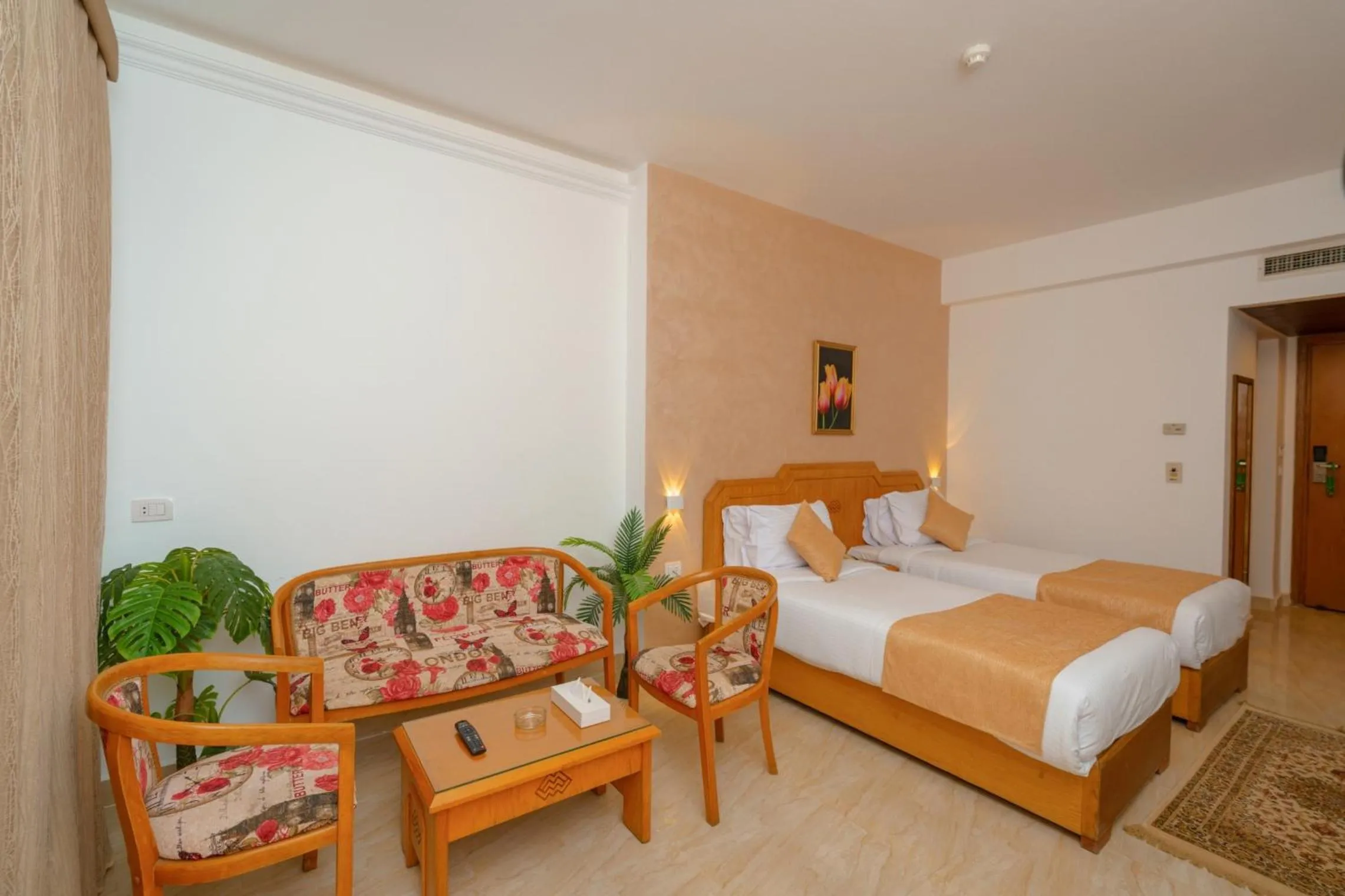 Seating area, Bed in MinaMark Beach Resort for Families and Couples Only