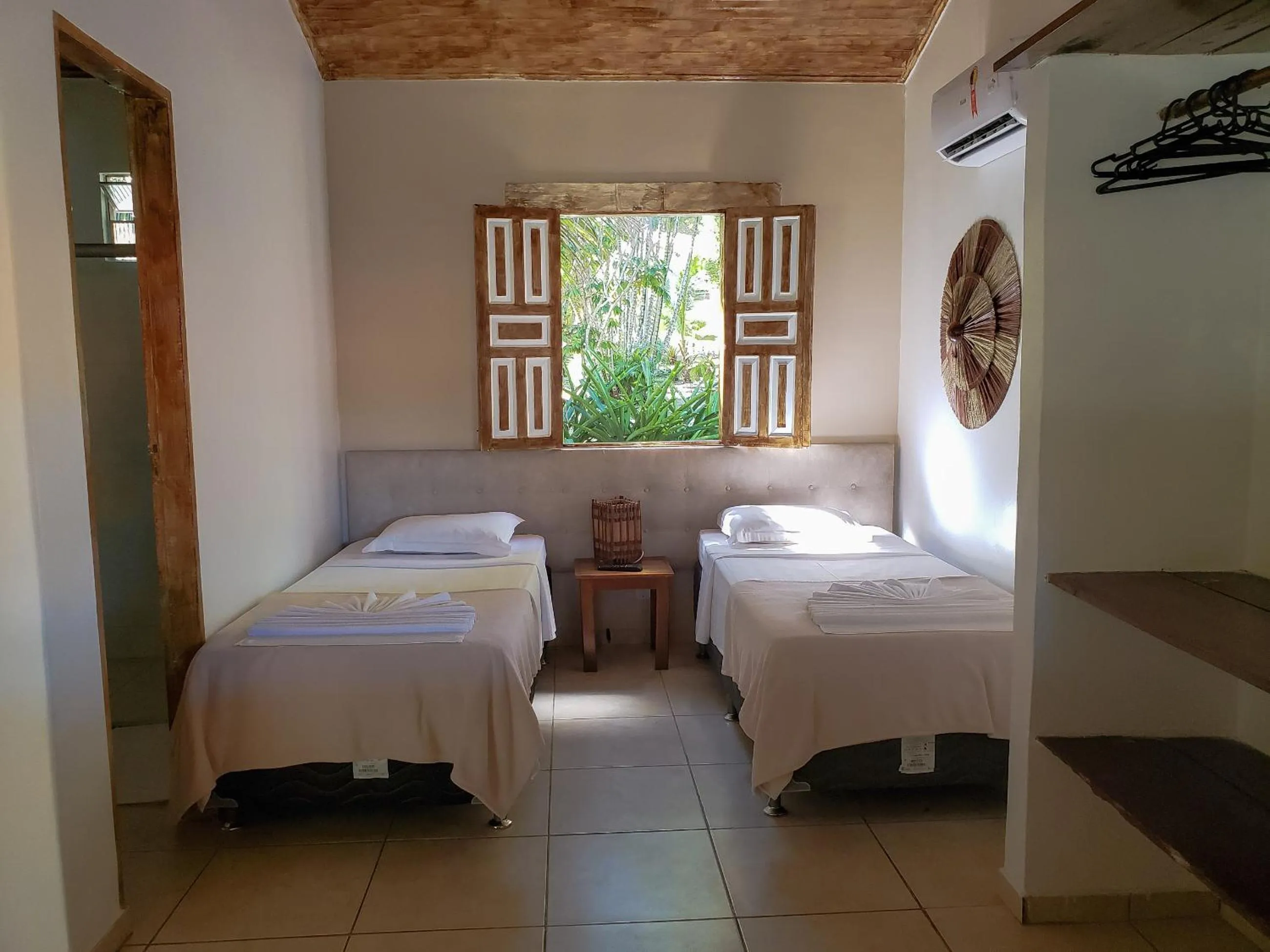 Bed in Pousada Tropical