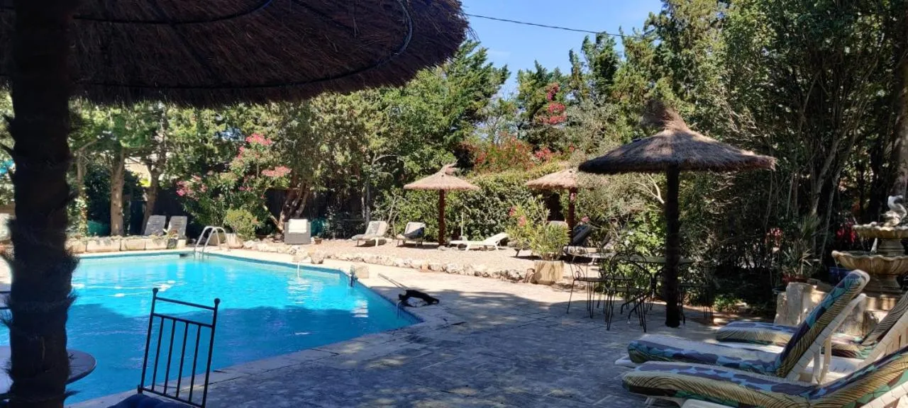 Swimming pool in Gites Climatisés Piscine Chauffée La Balancelle