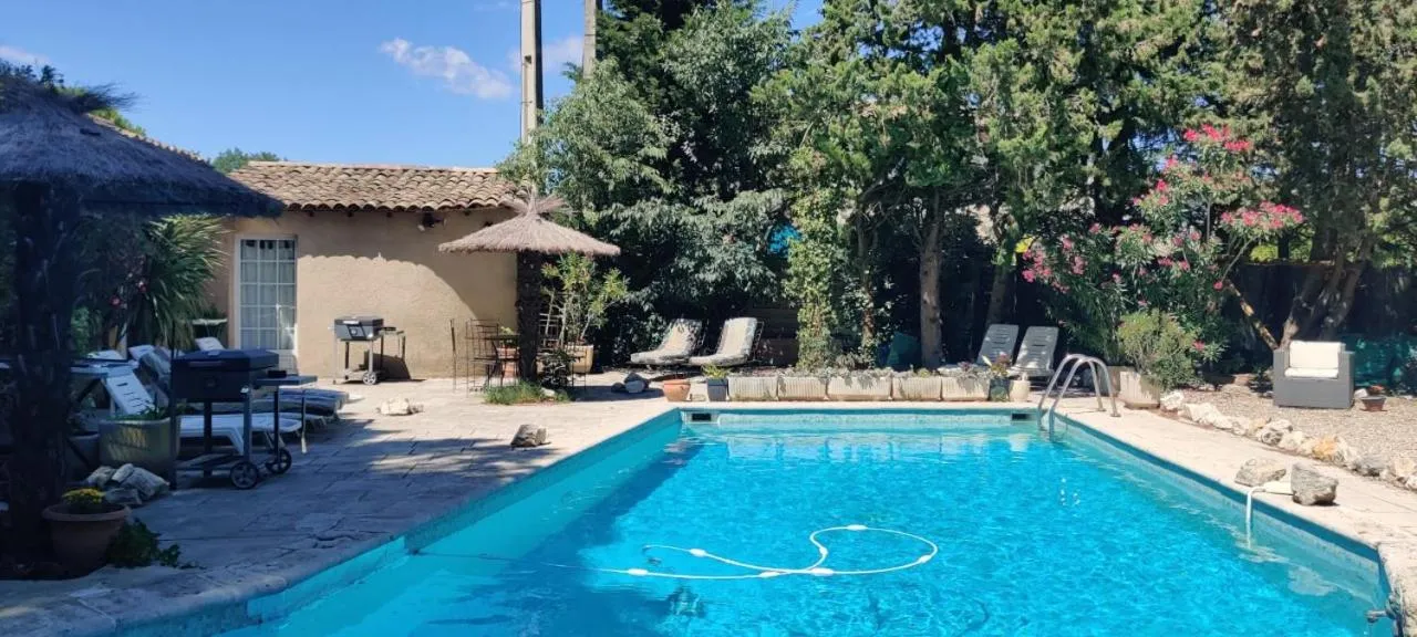 Swimming pool in Gites Climatisés Piscine Chauffée La Balancelle